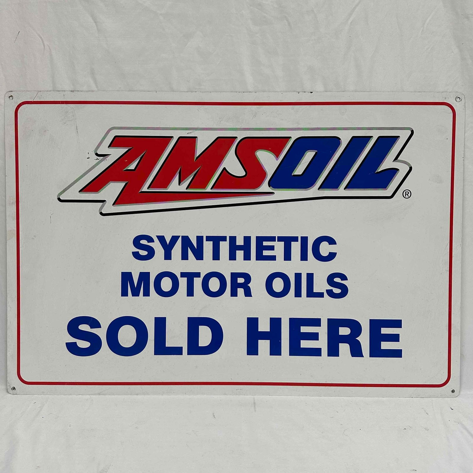 AMSOIL Synthetic Motor Oils Sold Here Amsoil Oil Company Ad Advertisement Garage Decor Metal Sign: AMSOIL Synthetic Motor Oils Sold Here Amsoil Oil Company Ad Advertisement Garage Decor Metal Sign. This vintage tin metal ad sign has wear, markings, and light noticeable scratches. This item is in pr