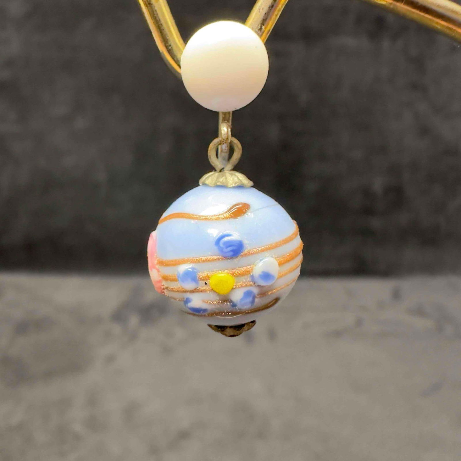 Murano Venetian Art Glass Lamp Work Blue Colored White Bead Accents Dangle Earrings G89: Murano Venetian Art Glass Lamp Work Blue Colored White Bead Accents Dangle Earrings G89. Earrings with blue colored glass beads with beautiful designs on each. The earrings feature copper colored