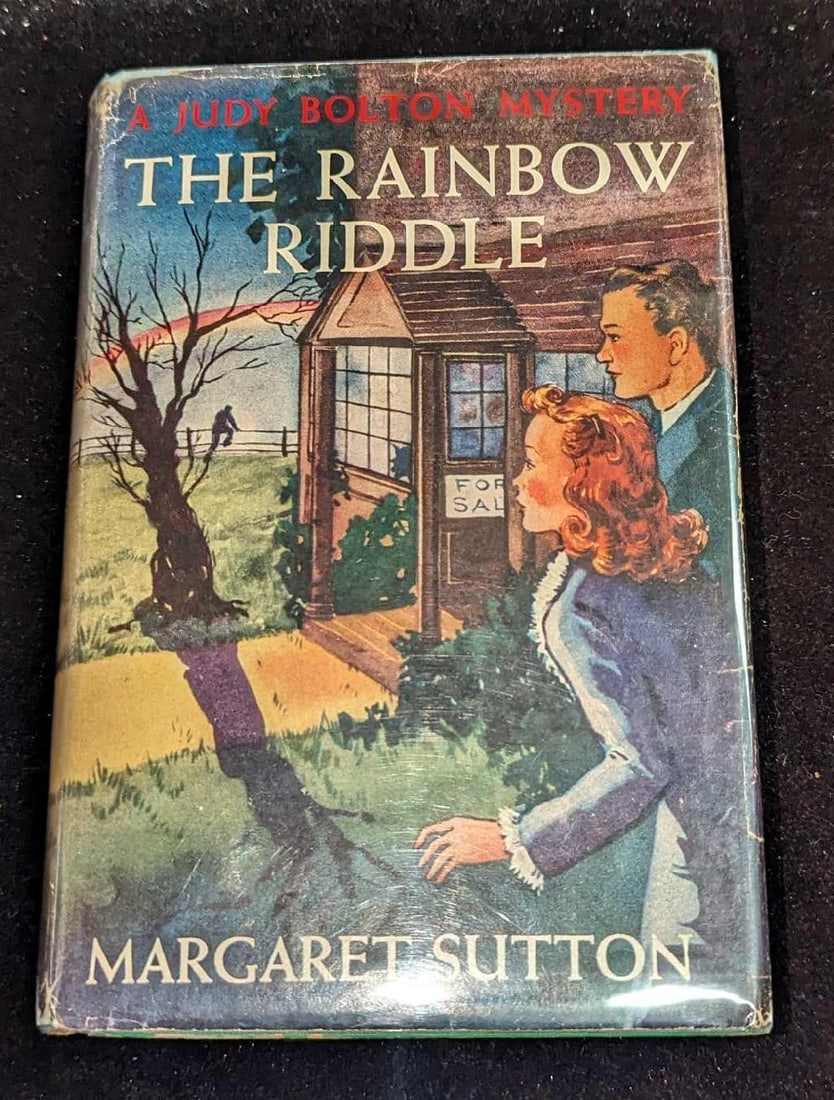 1st Ed Judy Bolton The Rainbow Riddle HC #17: 1st Ed Judy Bolton The Rainbow Riddle HC #17. "A Judy Bolton Mystery - 1st Ed Judy Bolton The Rainbow Riddle HC #17". By Margaret Sutton (The pen name of Rachel Beebe) and was published by Grosset &