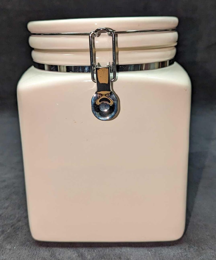 Conagra Brand Ceramic Cookie Jar: Conagra Brand Ceramic Cookie Jar. This is approx 6 1/4" x 8" x 9" and it weighs 4.47lbs. There is a smell imperfection on the front, top right corner. 