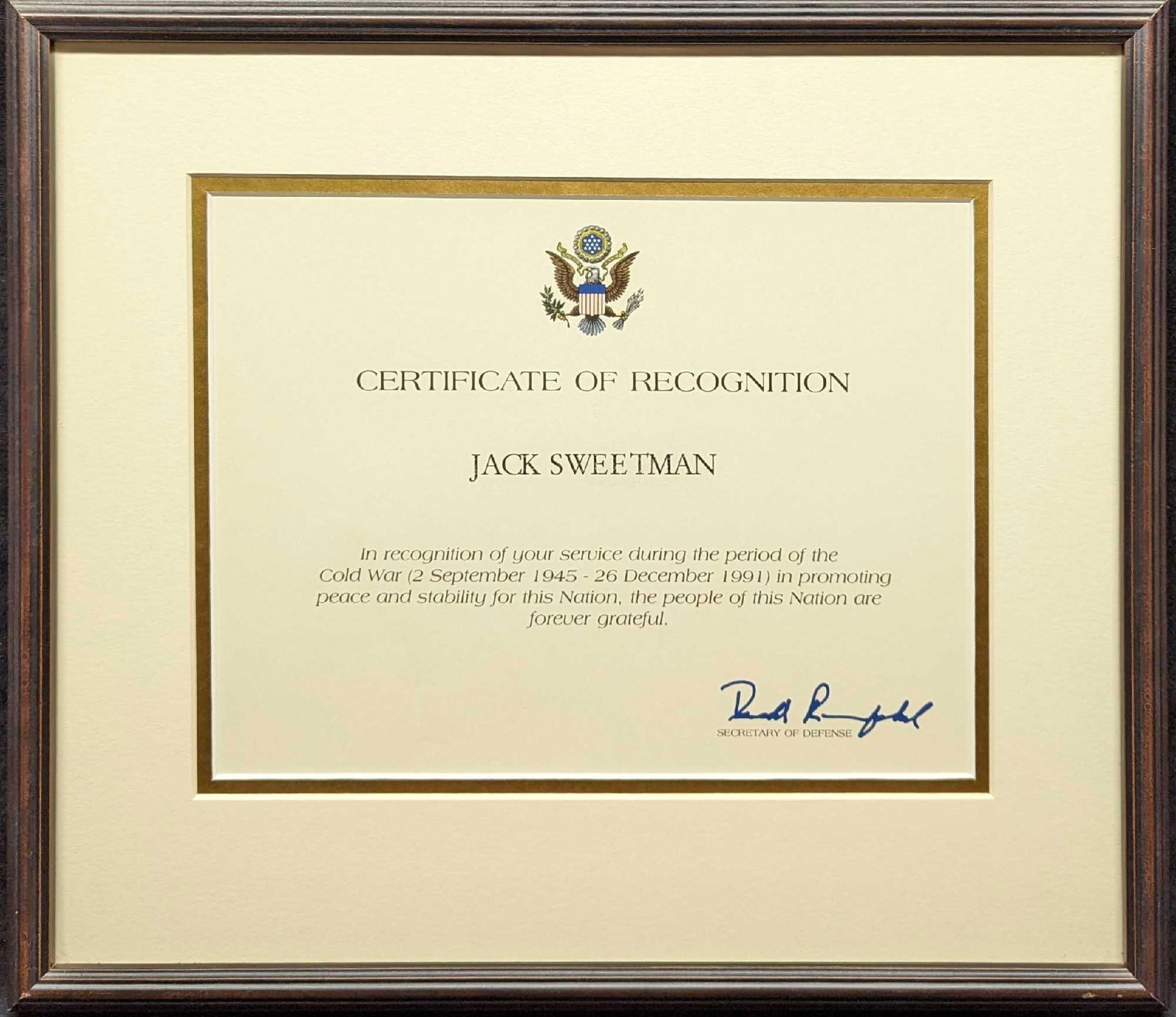 Framed Donald Rumsfeld Certificate Of Recognition: Framed Donald Rumsfeld Certificate Of Recognition. These were sent out in recognition of one's service during the Cold War. The signature appears to be printed. The framed certificate is approx 15 7/8
