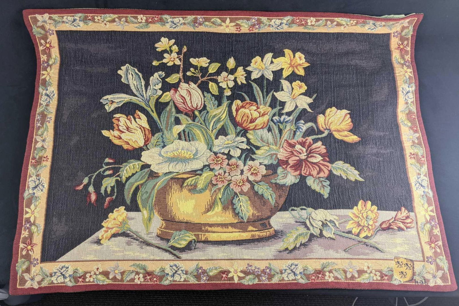 Floral Tapestry J. Pansu Paris.: Floral Tapestry This tapestry has a floral design on the front with a green cloth back. This tapestry is from Paris from the company J. Pansu Paris. They are traditional tapestry makers. It has a
