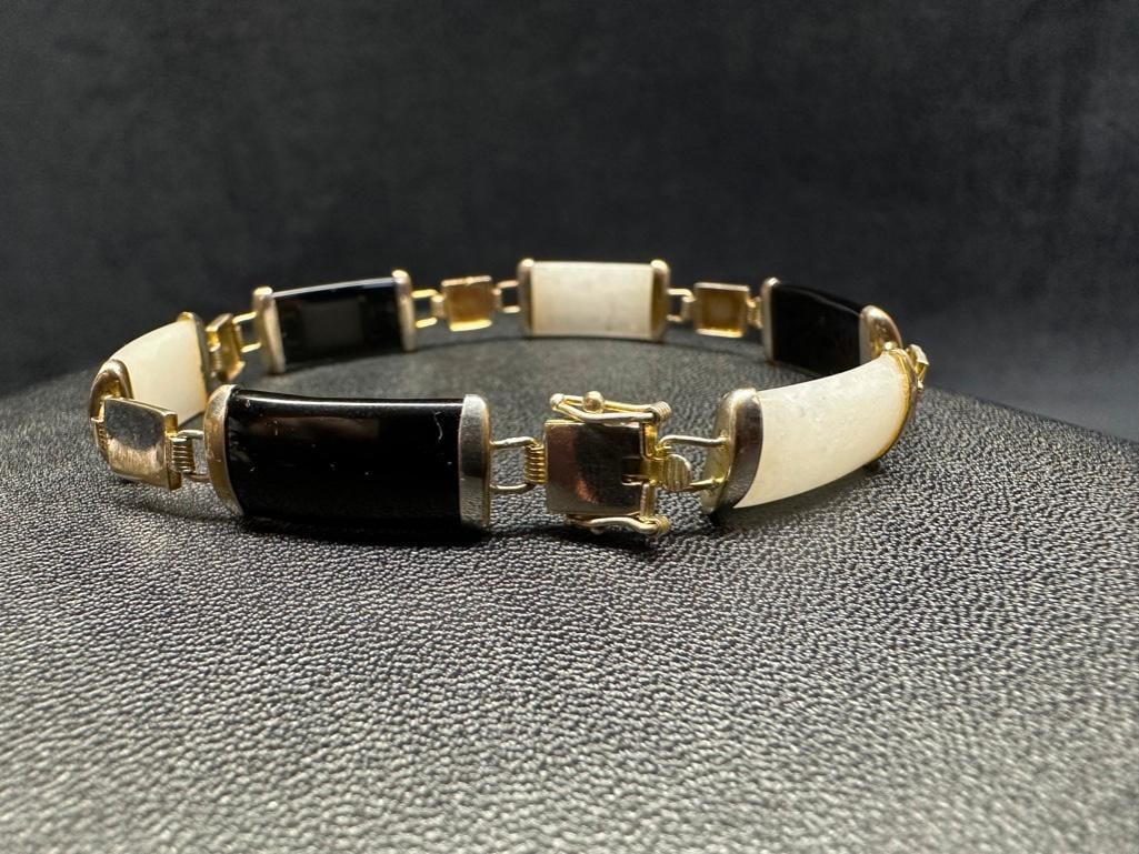 Sterling Bracelet With White Jade & Black Stone: This piece of jewelry has been tested and researched prior to listing. Please view all our pictures they are part of our description. DETAILS: Metal - Sterling SilverColor - SilverStones - White