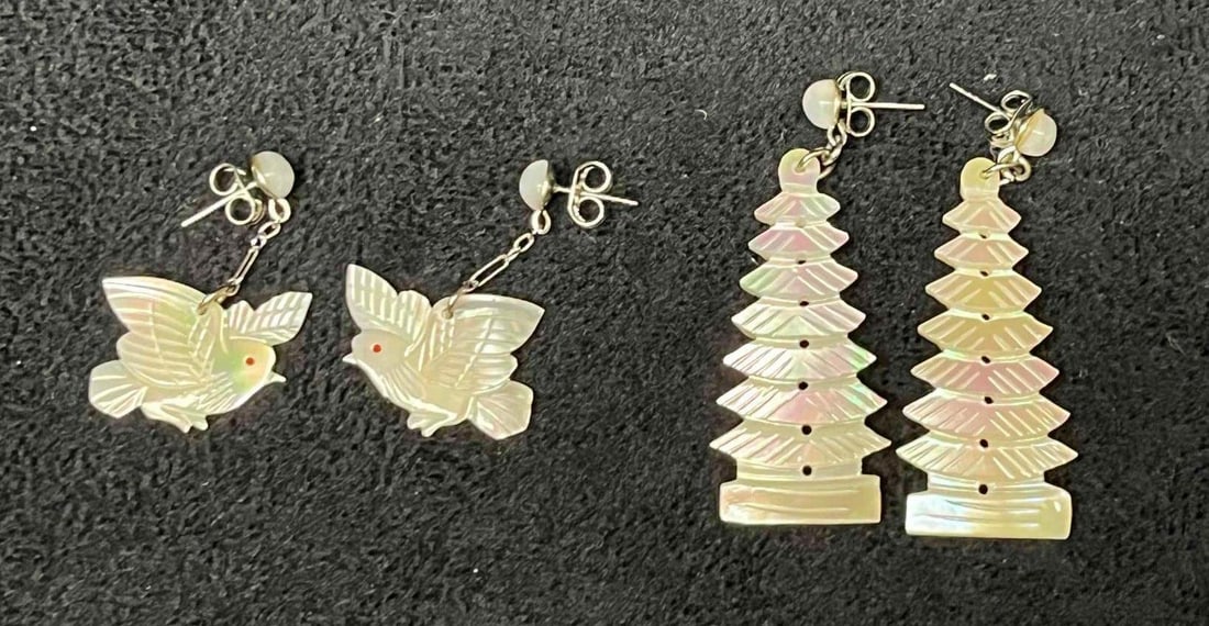 Vintage Mother Of Pearl Hand Carved Pagoda & Bird Earrings: This lot contains a Vintage Mother Of Pearl Hand Carved Pagoda & Bird Earrings. The earrings fit in a small 3 3/4" x 2 1/4" plastic bag. Total weight is approx less than 1oz. Overall the Mother of pea