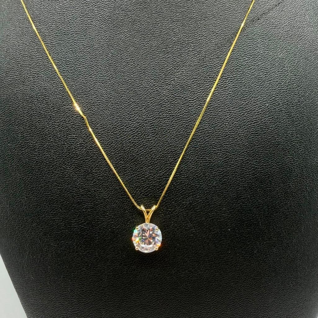 14k Gold Round CZ Pendant Necklace: This piece of jewelry has been tested and researched prior to listing. Please view all our pictures they are part of our description. DETAILS: Metal - 14k Gold Color - Yellow Gold Stones - CZ Hallmar