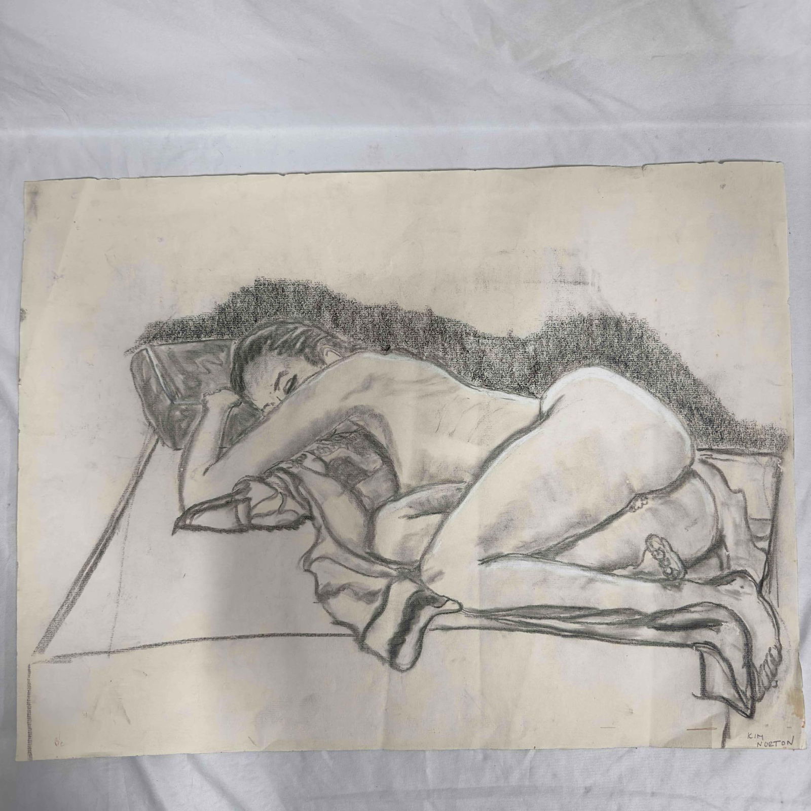 Naked Female Nude Erotic Bare Woman Lady Laying Down Kim Norton Pencil Sketch Drawing: Naked Female Nude Erotic Bare Woman Lady Laying Down Kim Norton Pencil Sketch Drawing. A pencil sketch featuring a nude woman laying down on the bed. Kim Norton written on the bottom right corner. A