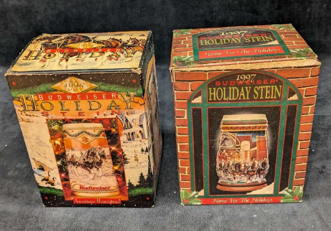 1996 And 1997 Budweiser Holiday Steins With Boxes: 1996 And 1997 Budweiser Holiday Steins With Boxes. This lot includes: (1) 1997 "Home For The Holidays". The ceramic stein comes with the original box that is approx 6" x 4 1/2" x 7