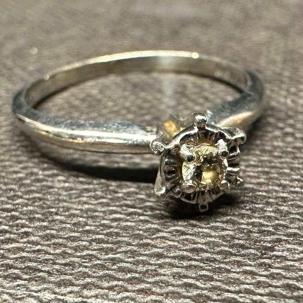 10k White Gold Diamond Solitaire Ring: This piece of jewelry has been tested and researched prior to listing. Please view all our pictures they are part of our description. DETAILS: Metal - 10k GoldColor - White GoldStones - Diamond, est.