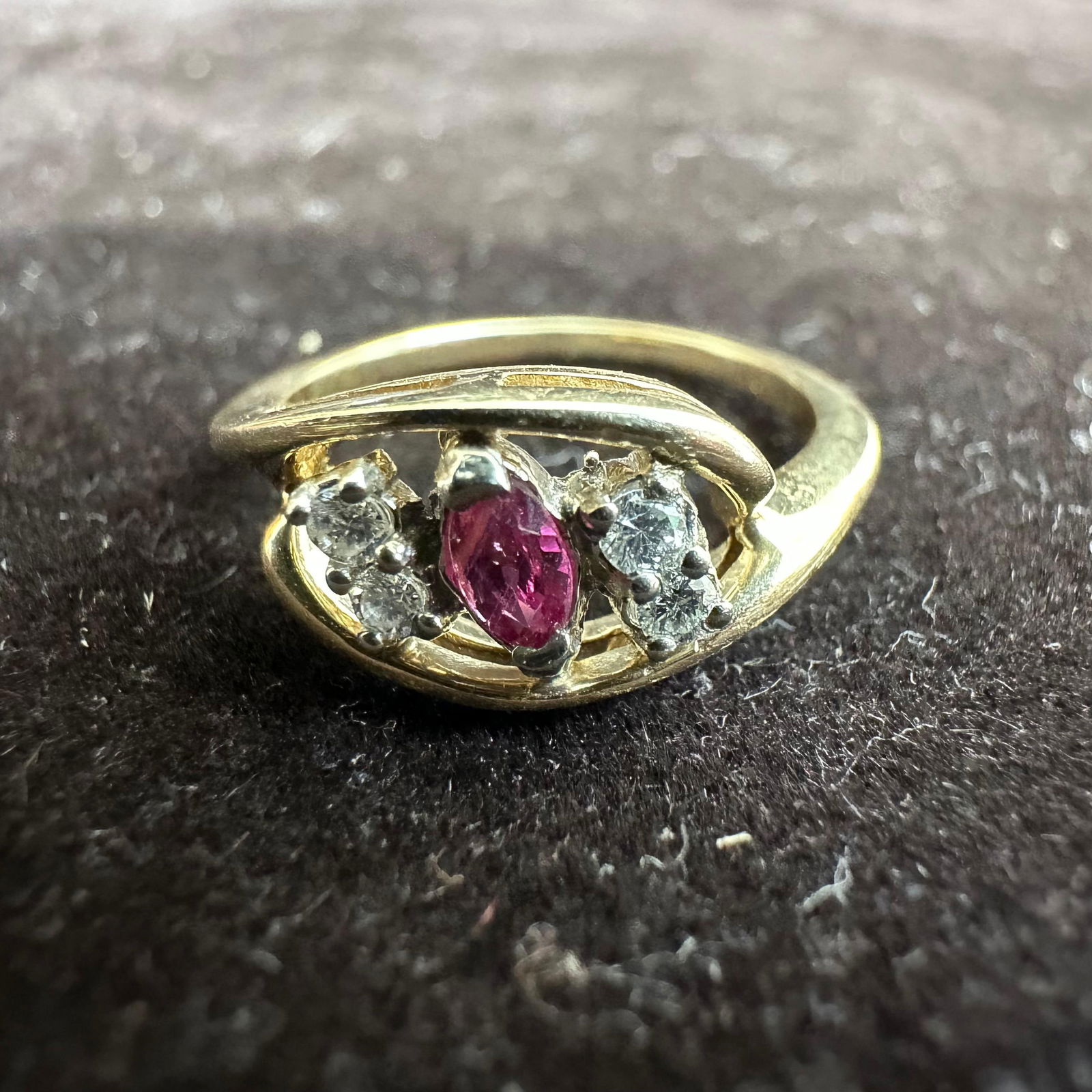 Ruby and Four Moissanite Diamond 14K Gold Ring: This item is in good pre-owned, previously used/displayed condition with noticeable light wear and surface scratches. Please reference all photos for full details. This piece of jewelry has been