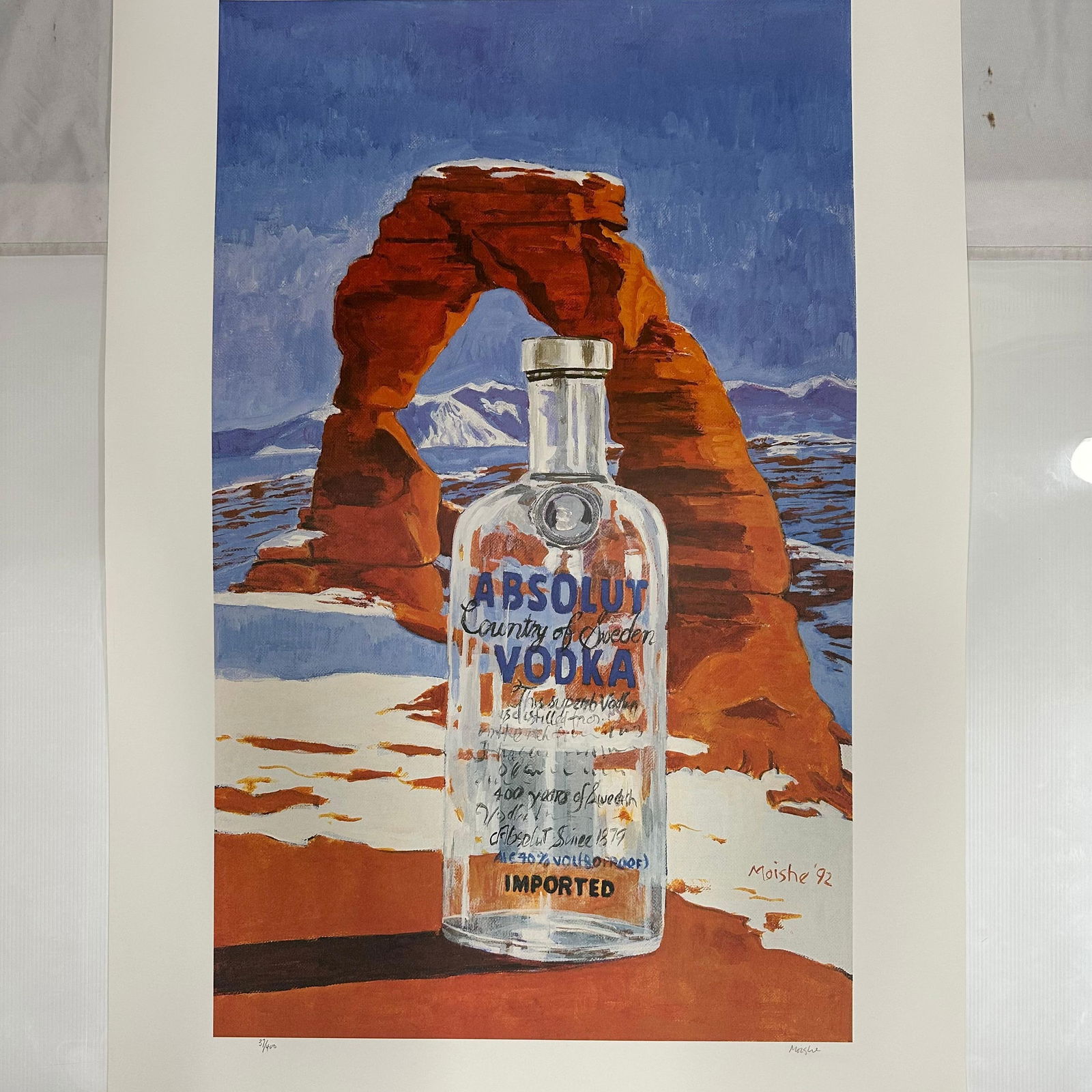Signed and Numbered Absolut Vodka Statehood Utah Moishe Smith Print 37/400: Limited edition Absolut Vodka “Statehood” lithograph print on paper. Features the iconic Absolut bottle incorporated into a stylized Utah-themed landscape composition. Hand-signed by the
