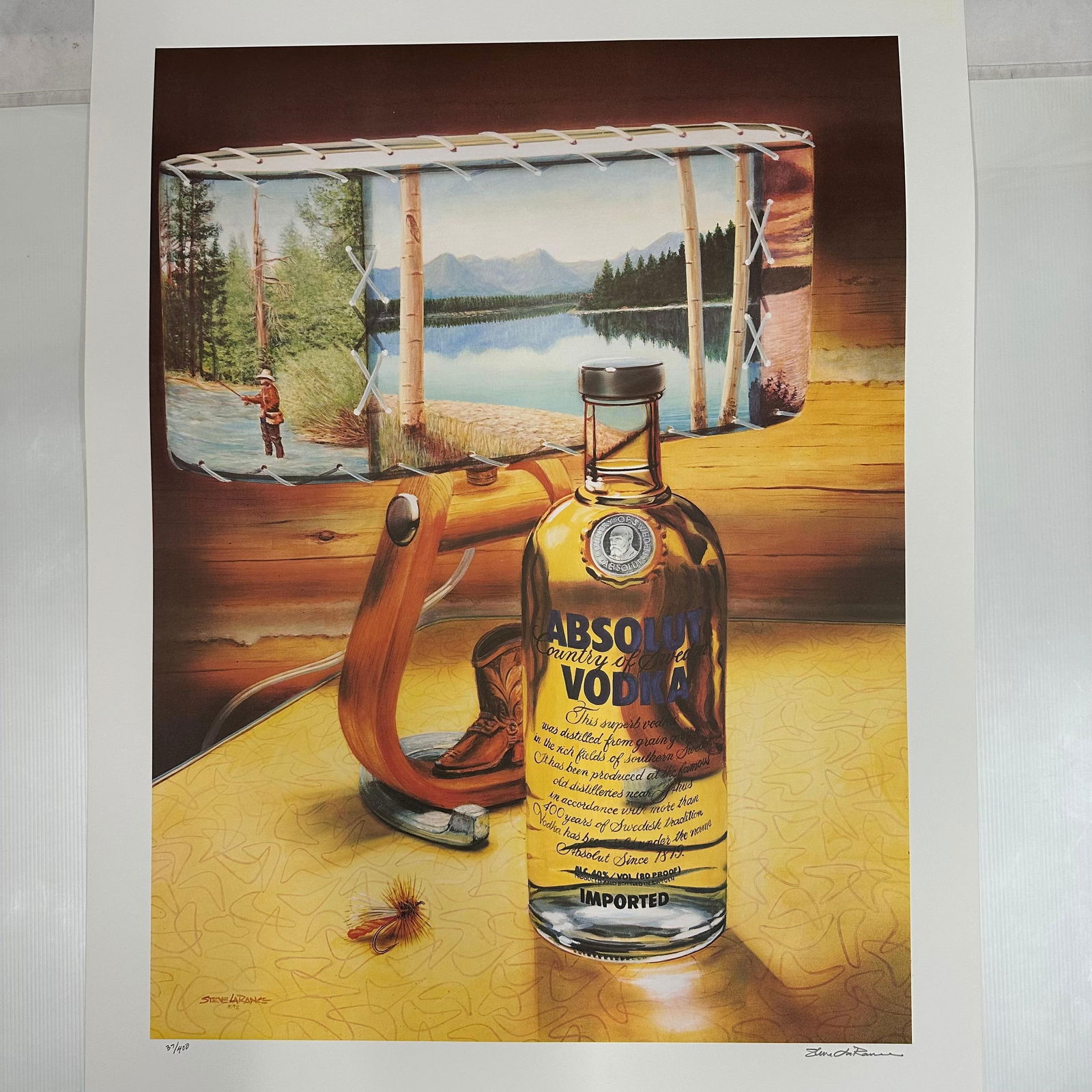 Signed and Numbered Absolut Vodka Statehood Montana Steve LaRance Print 37/400: Limited edition Absolut Vodka “Statehood” lithograph print on paper. Features the iconic Absolut bottle incorporated into a stylized Montana-themed landscape composition. Hand-signed by