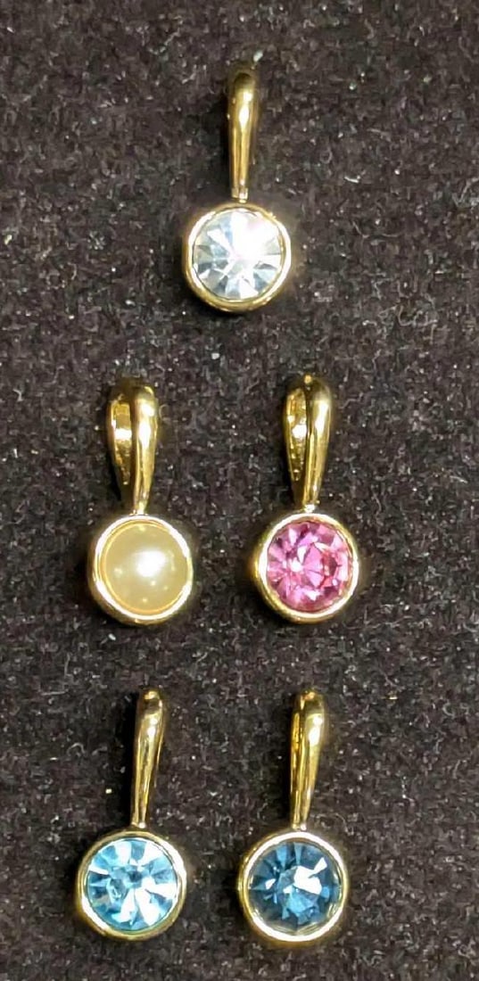 5 Nolan Miller Rhinestone & Faux Pearl Pendants: 5 Nolan Miller Rhinestone & Faux Pearl Pendants. Each goldtone pendant is approx 3/8" x 1/4" x 1". It comes in a bag that is approx 2" x 1/4" x 2 1/4" and it weighs 0.02lb.