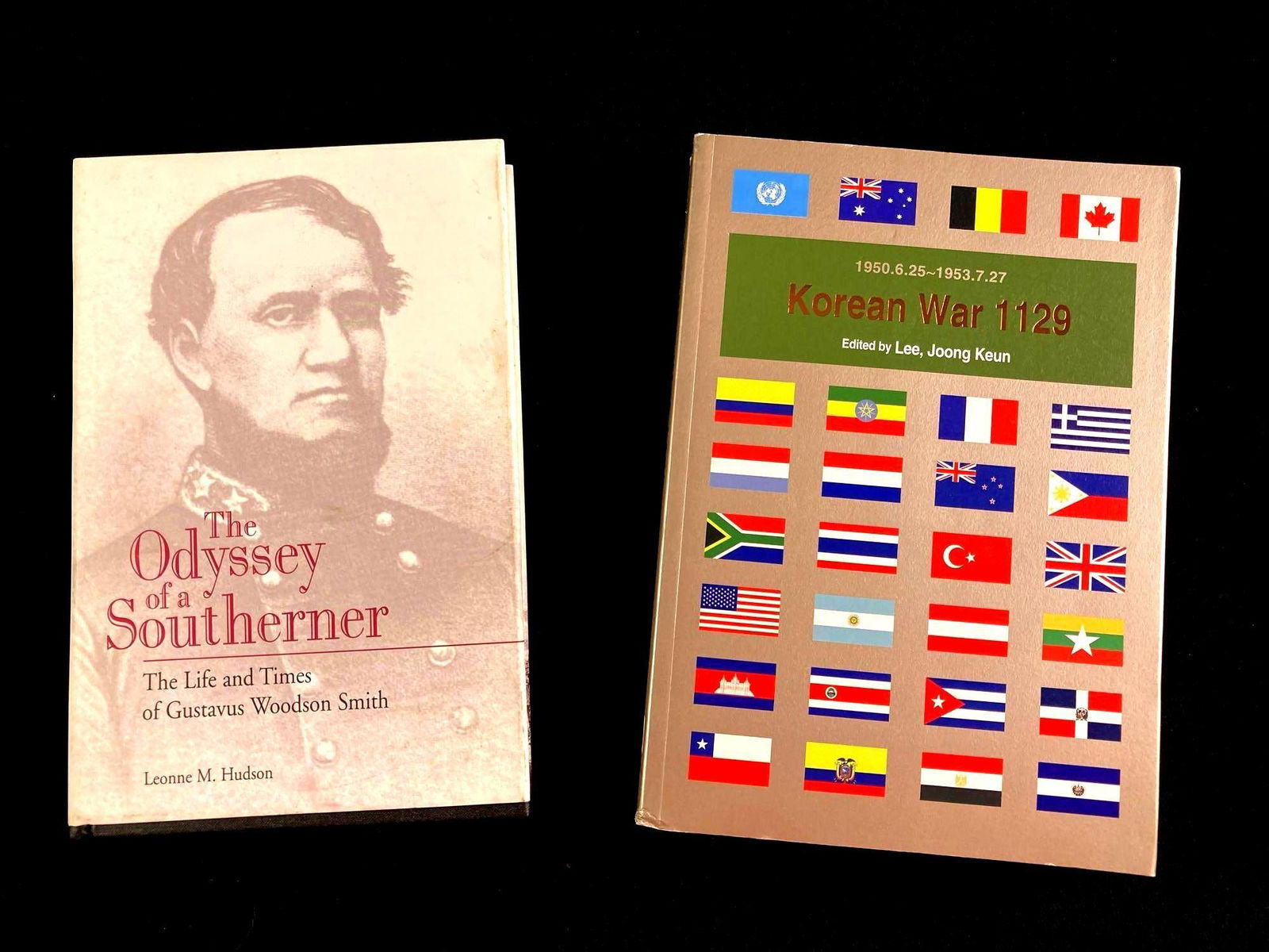 (2) Military History Books The Odyssey of a Southerner & The Korean War 1129: This lot includes: (1) The Odyssey of a Southerner by Leonne Hudson (1) The Korean War 1129 by Joong Keun Lee Condition is used and see photograp