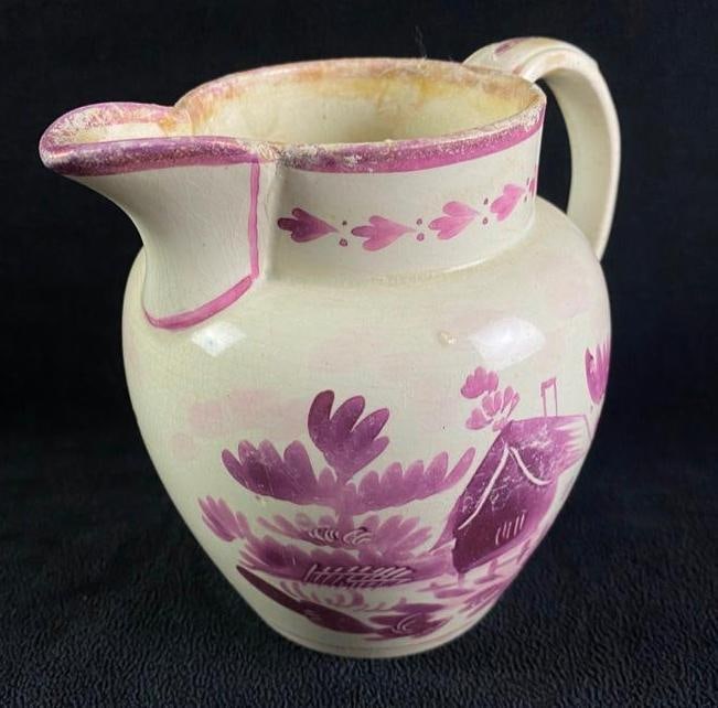 Pink Lustreware Creamer: Antique Pink Lustreware Creamer Pink Lustreware porcelain creamer from the early 1800s, made in England. These porcelain sets with the trademark pink pearlescent designs were popular among