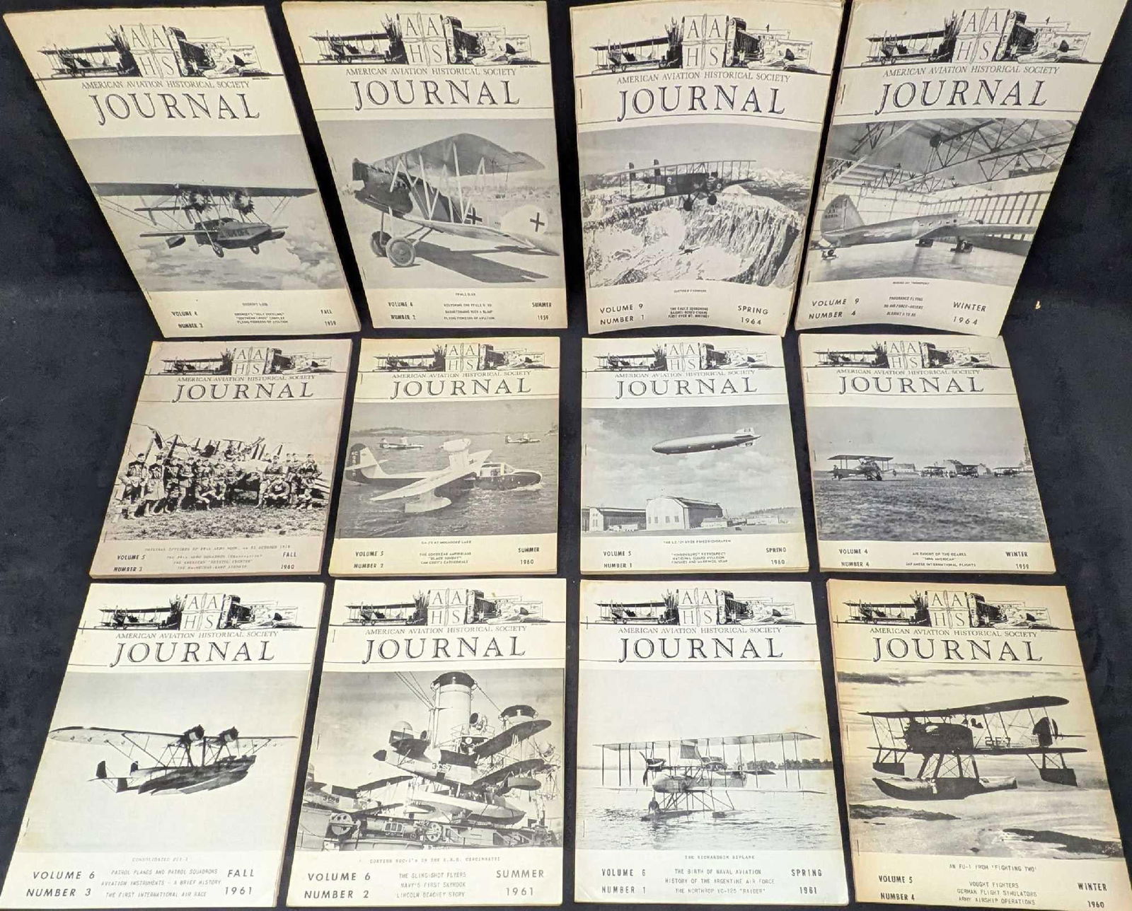 12 1950s & 1960s American Aviation Historical Society Journals A: 12 1950s & 1960s American Aviation Historical Society Journals A. Each journal is approx 8 1/2" x 1/8" x 10 7/8" and the total weight is 5.30lbs. The covers have some shelf wear. Please see the