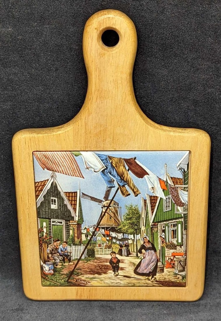 Ter Steege Holland Tile Wood Cheese Cutting Board: Ter Steege Holland Tile Wood Cheese Cutting Board. This is approx 7 1/2" x 1/2 11 3/4" and it weighs 1.29lb. The wood board has some chips and light scratches. 