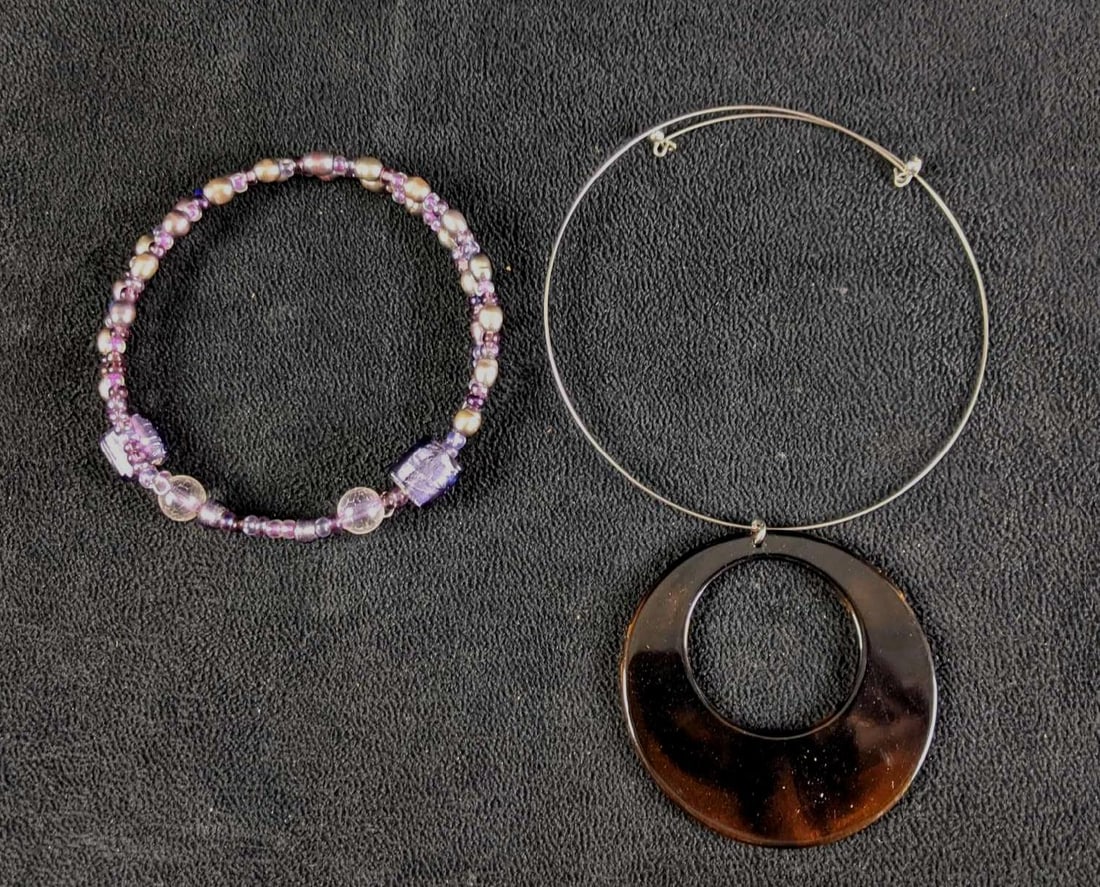 Wrap Style Necklace Purple Choker Necklace: Wrap Style Necklace Purple Choker Necklace This lot has two necklaces They are both short wrap style necklaces like chokers (1) Purple beaded with river pearls (1) Wire with round pendant