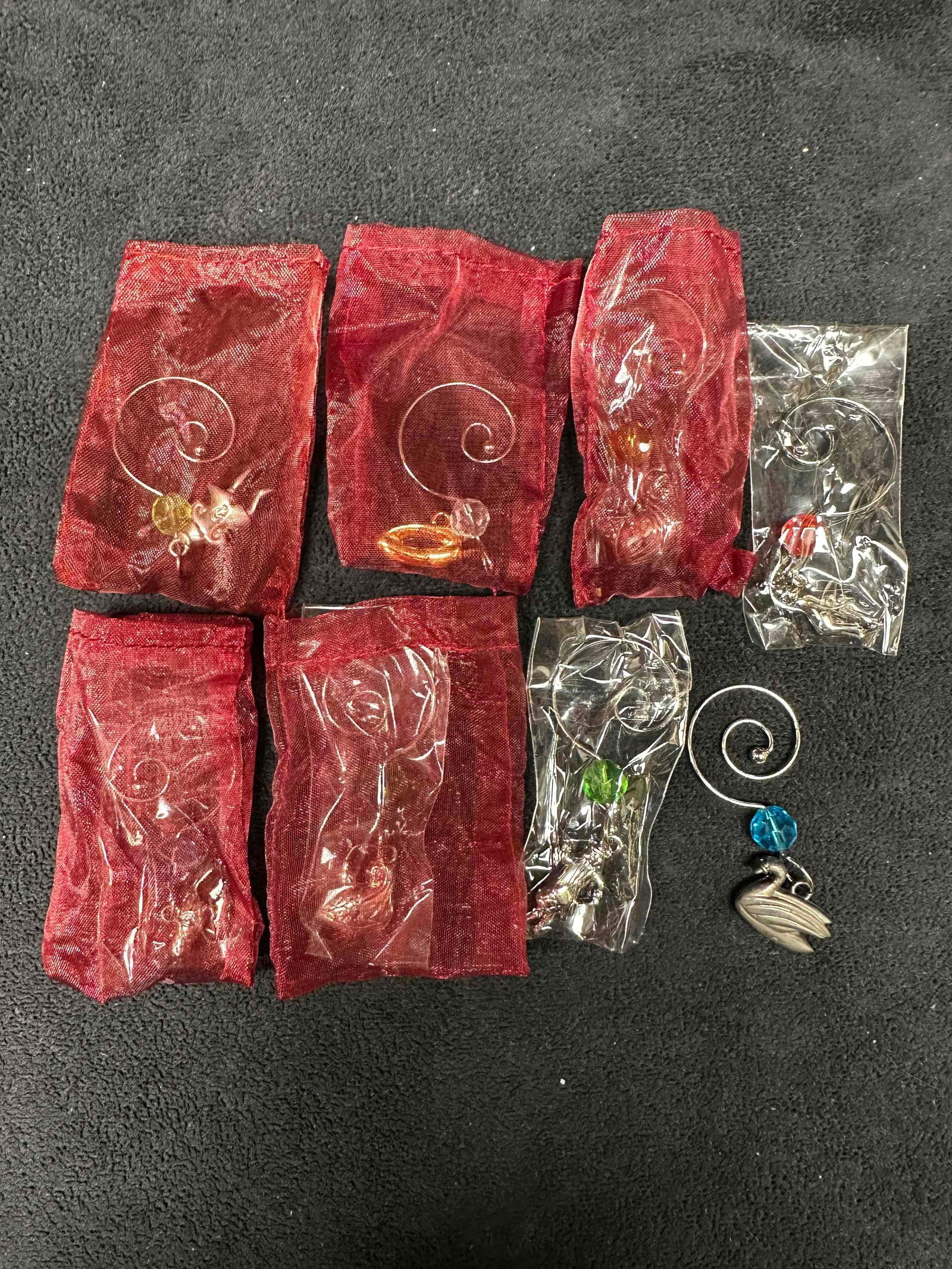 Waterford Crystal Ornament Beaded Wine Glass Enhancer Charm Set: Some of the charms are still sealed in plastic sleeve and come with marron red dust bag. These items are in good pre-owned, previously displayed condition with light wear, and surface scratches. Pleas