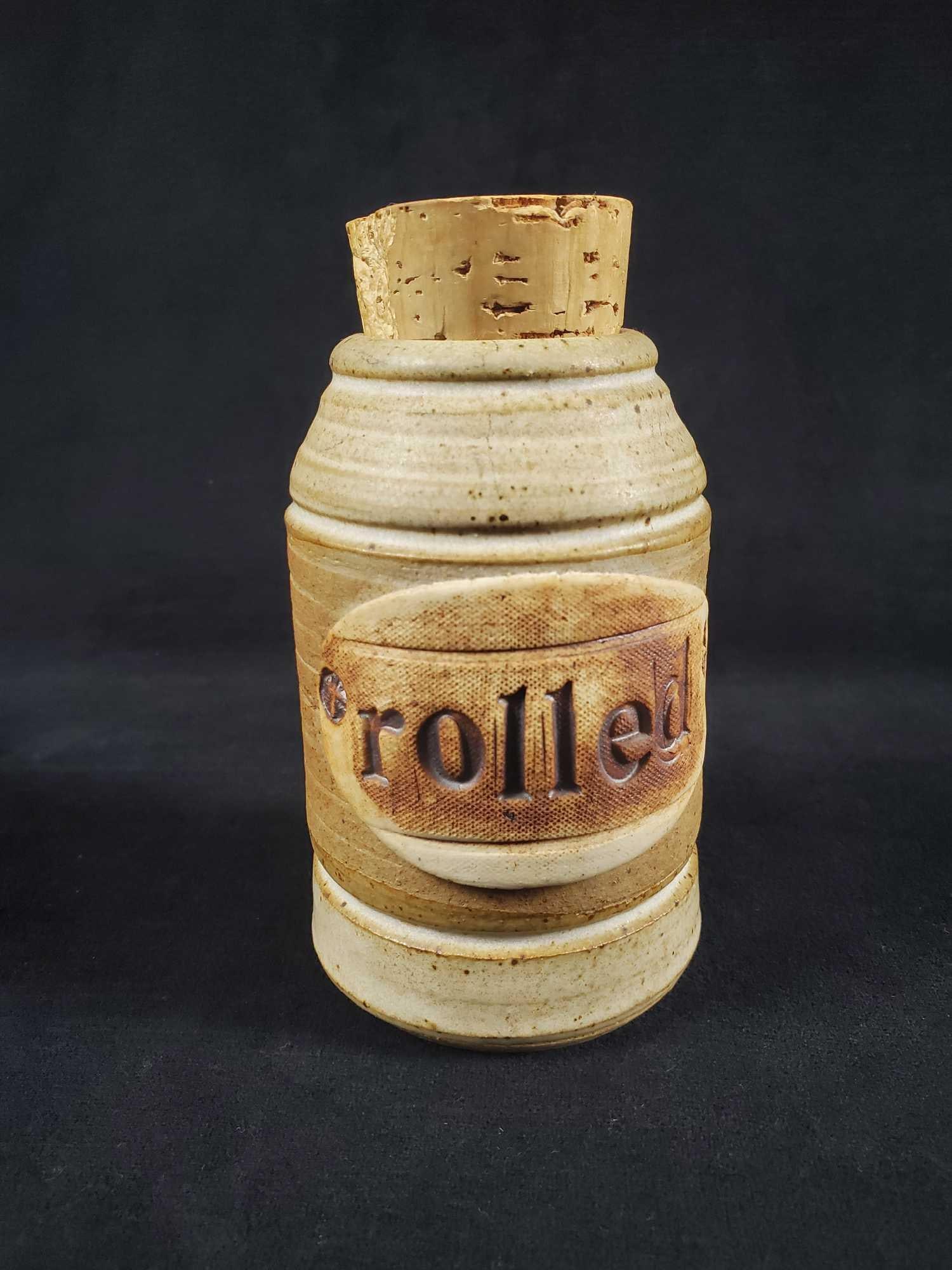 Vintage Dr Brophys Word Jar Brain Storms: Vintage Dr. Brophy's Word Jar Brain Storms, Pottery Jar with Cork Lid, Multi-Color. From 1991. This one is "rolled". Can be used as a piggy bank. Is approx 3 1/2" x 3 1/2" x 5 1/2". Brain Storm