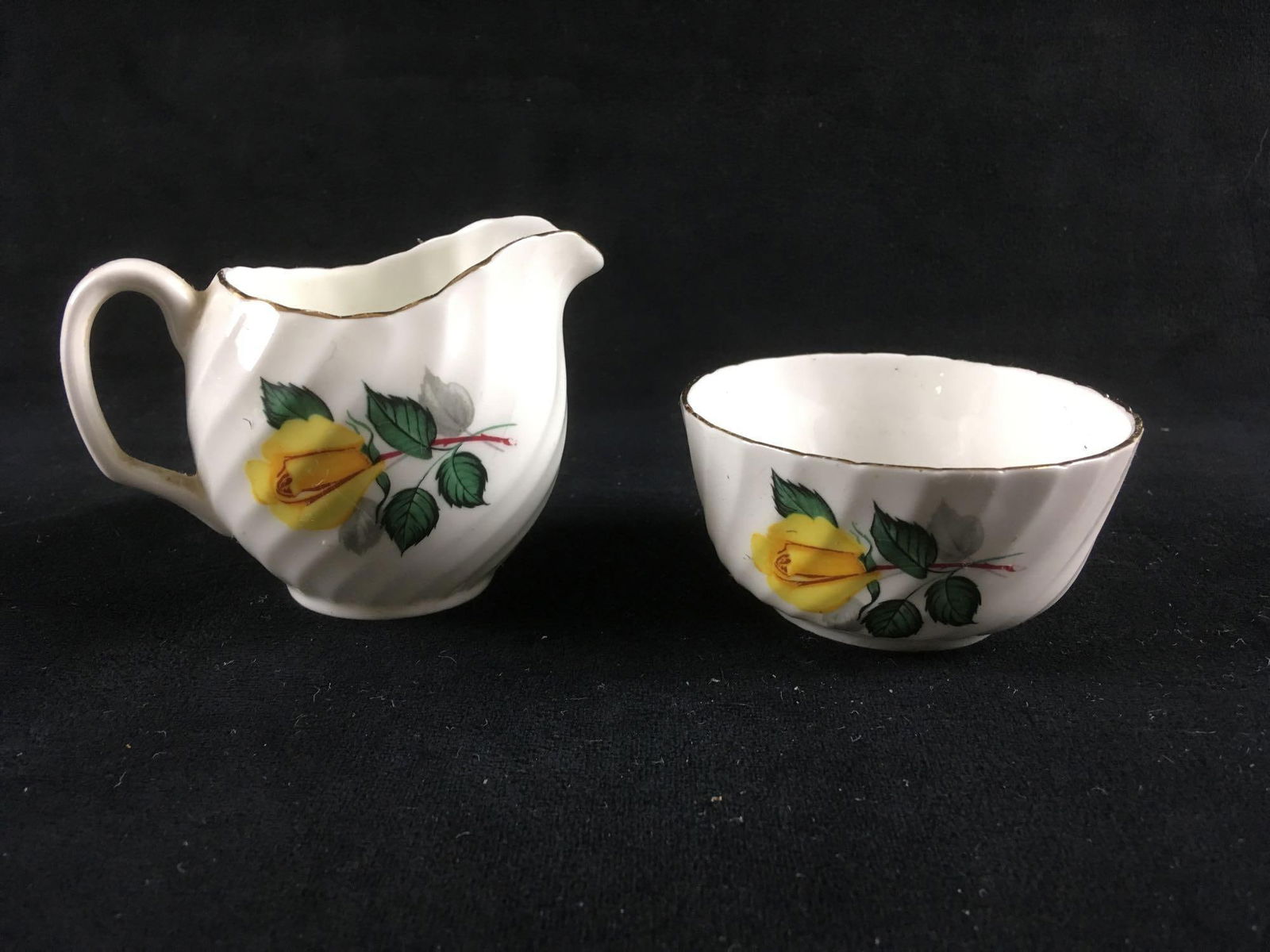 Vintage Royal Adderley Bone China Creamer and Sugar Bowl: Mini creamer and sugar bowl by England based Royal Adderley. Bowl is 3.1/8" in diameter and 1.5/8" tall. Creamer is 2.3/4" tall and 2.3/4" diameter. In good condition. 