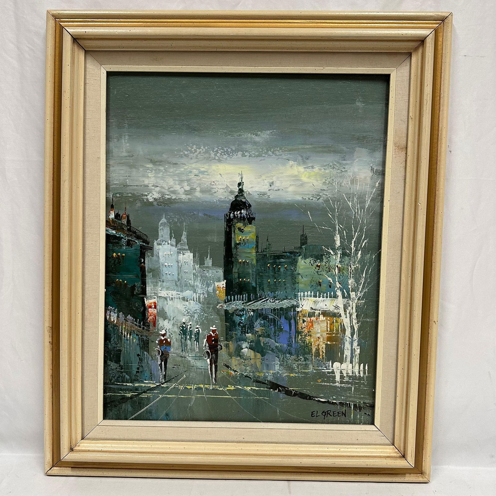 Framed London Street Scene Oil Painting Signed El Green: Original oil painting on canvas depicting a moody London cityscape with figures walking along a street. The composition features Big Ben and the surrounding architecture under a cloudy sky. Signed EL