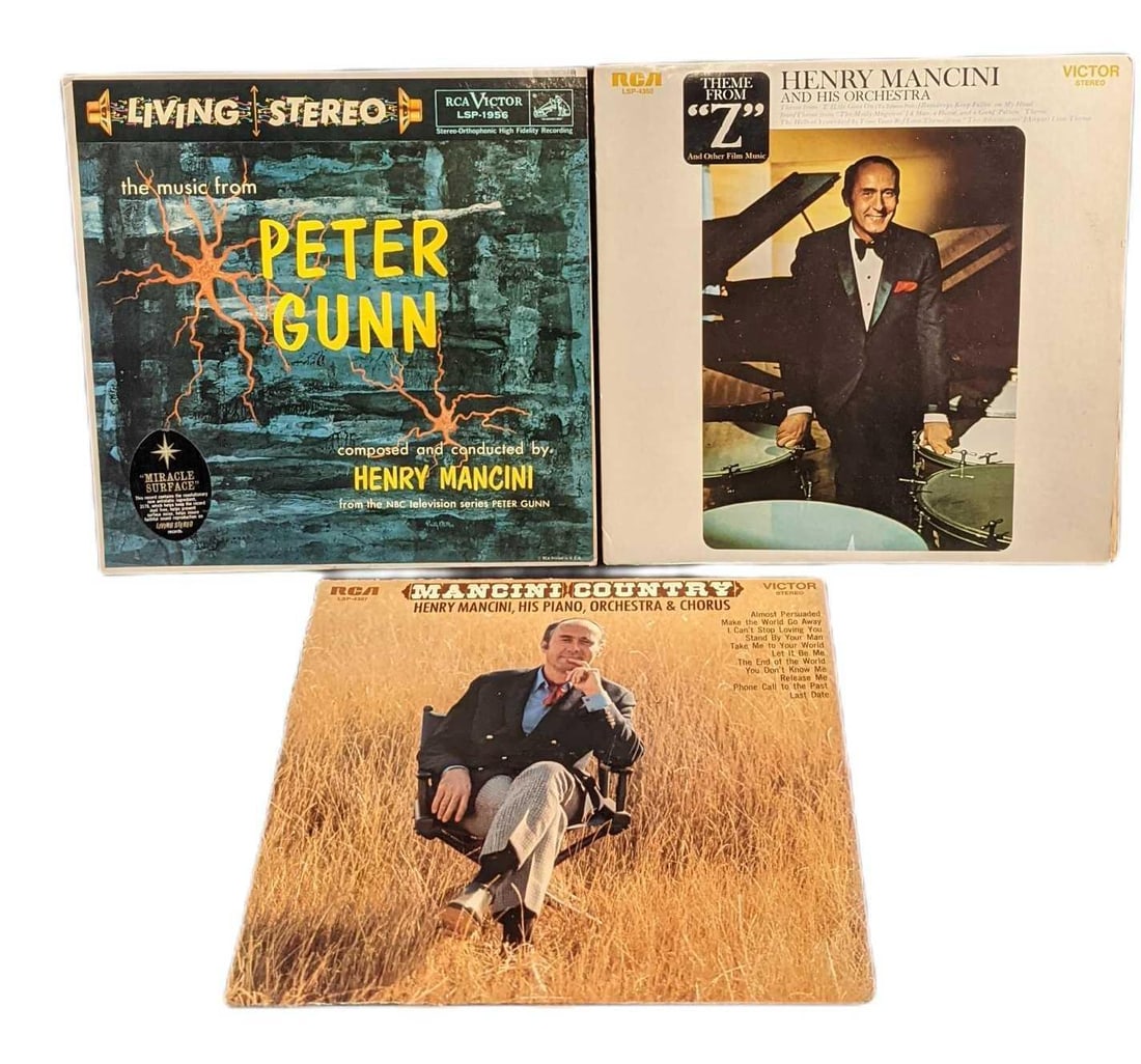 Three Classic Henry Mancini Vinyl LP Records: Often cited as one of the greatest composers in the history of film Henry Mancini won four Academy Awards, a Golden Globe, and twenty Grammy Awards, plus a posthumous Grammy Lifetime Achievement Award
