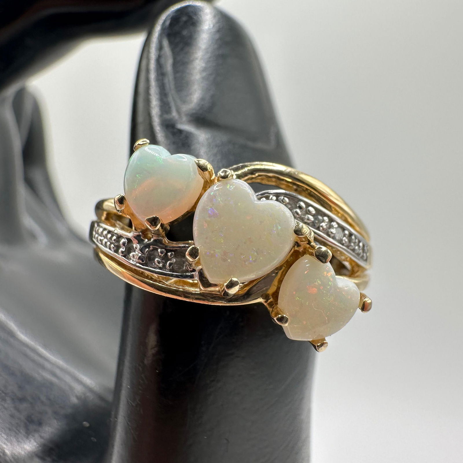 Triple Heart Shaped Opals Accent Diamonds 14K Gold Ring: This item is in good pre-owned, previously used/displayed condition with noticeable light wear and surface scratches. Please reference all photos for full details. This piece of jewelry has been