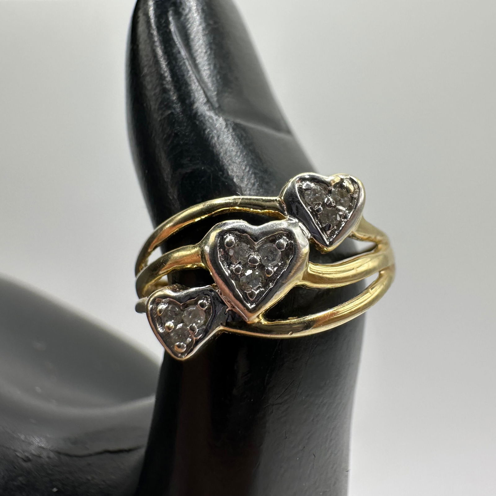 Triple Heart Diamond Accents 14K Gold Ring W96: This item is in good pre-owned, previously used/displayed condition with noticeable light wear and surface scratches. Please reference all photos for full details. This piece of jewelry has been