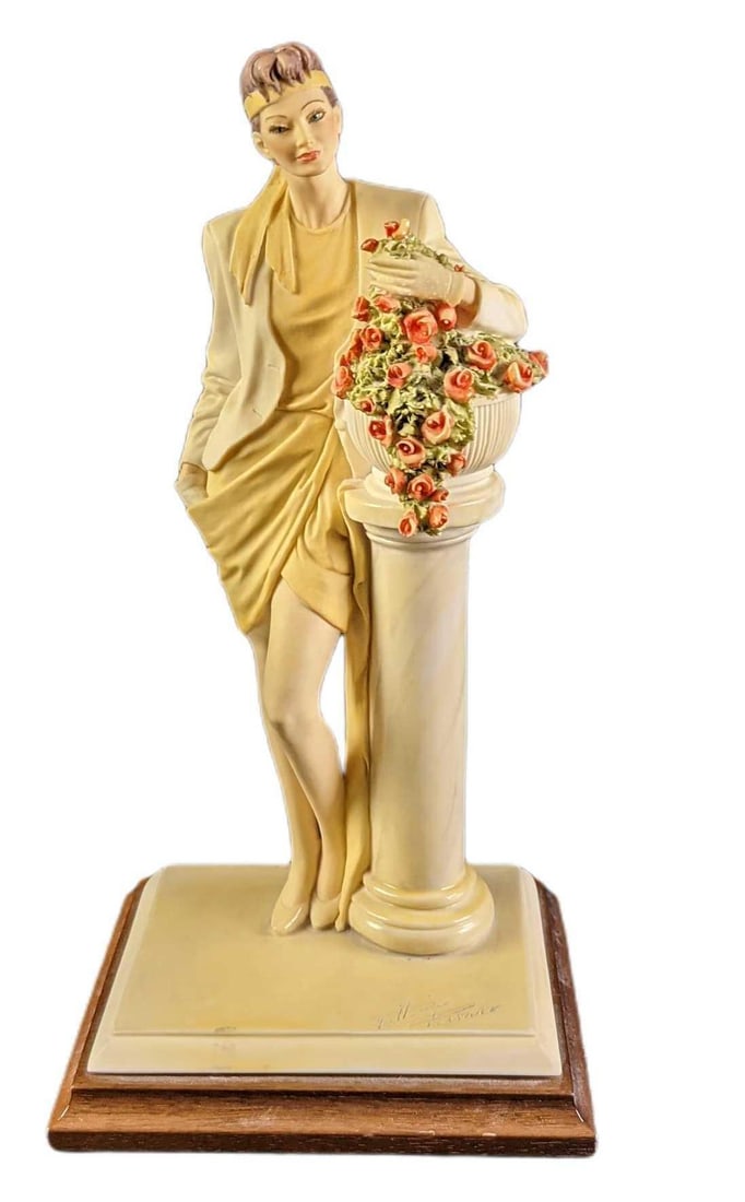 Vintage Vittorio Tessaro Rita Garden Bouquet 1980s Woman: Vintage Vittorio Tessaro Rita Garden Bouquet. Made of a polystone. Shows a woman that is wearing very 1980ish clothing. Is signed by the artist on the right. Made in Italy. Is approx 7" x 6" x 13"