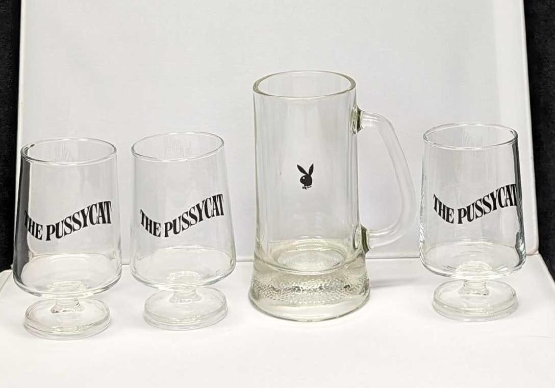 Pussy Cat Short Stemmed Glasses & Playboy Mug: Pussy Cat Short Stemmed Glasses & Playboy Mug. This lot includes: (3) The Pussycat Short Stemmed Glasses. Each is approx 3" x 3" x 5" and together they weigh 1.24lb.(1) Club Playboy