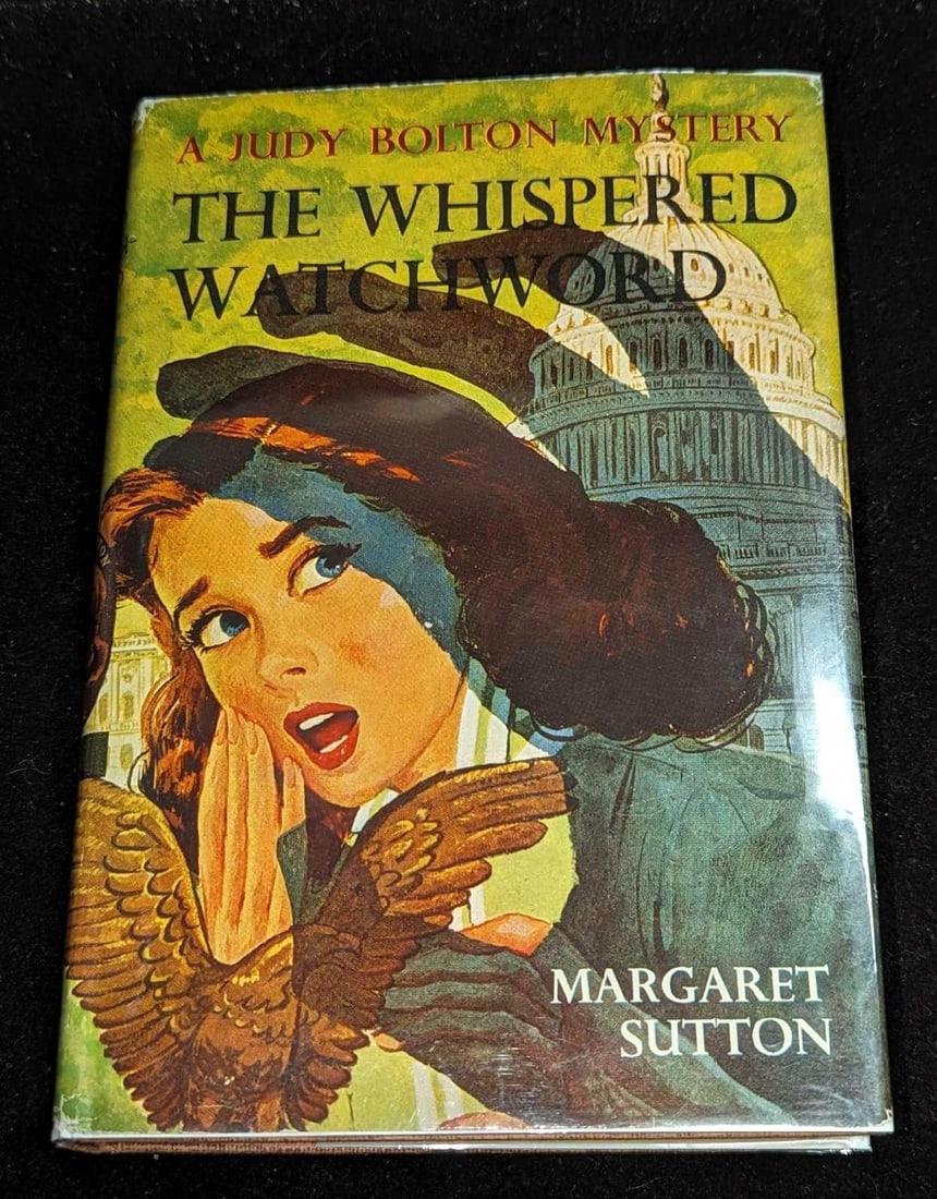 1st Ed Judy Bolton The Whispered Watchword #32 B: 1st Ed Judy Bolton The Whispered Watchword #32 B. "A Judy Bolton Mystery - The Whispered Watchword". By Margaret Sutton (The pen name of Rachel Beebe) and was published by Grosset & Dunlap (New York)