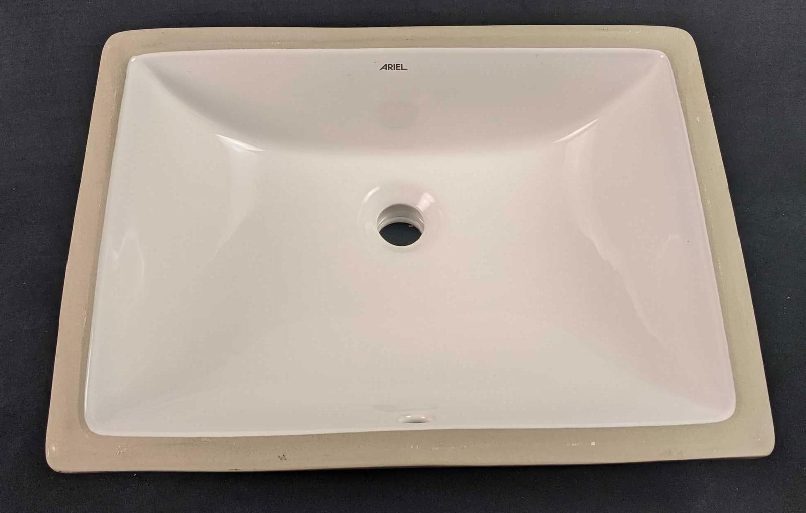 Ariel 20 5/8" x 14 3/4" White Undermount Porcelain Sink: Ariel 20 5/8" x 14 3/4" White Undermount Porcelain Sink. Weighs 19.5lbs. An Elegant Porcelain Sink Is An Affordable And Easy Way To Spruce Up Your Bathroom. Each Sink Is Beautifully Crafted To