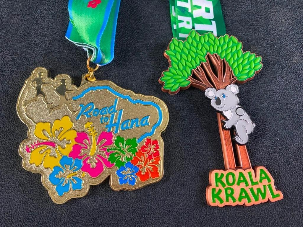 Pair of Virtual Race Medals, Australia & Hawaii JB: Pair of Virtual Race Medals, Australia & Hawaii Medals from two virtual races: The Road to Hana Challenge and The Koala Krawl. The medals feature colorful designs, cool shapes, and high