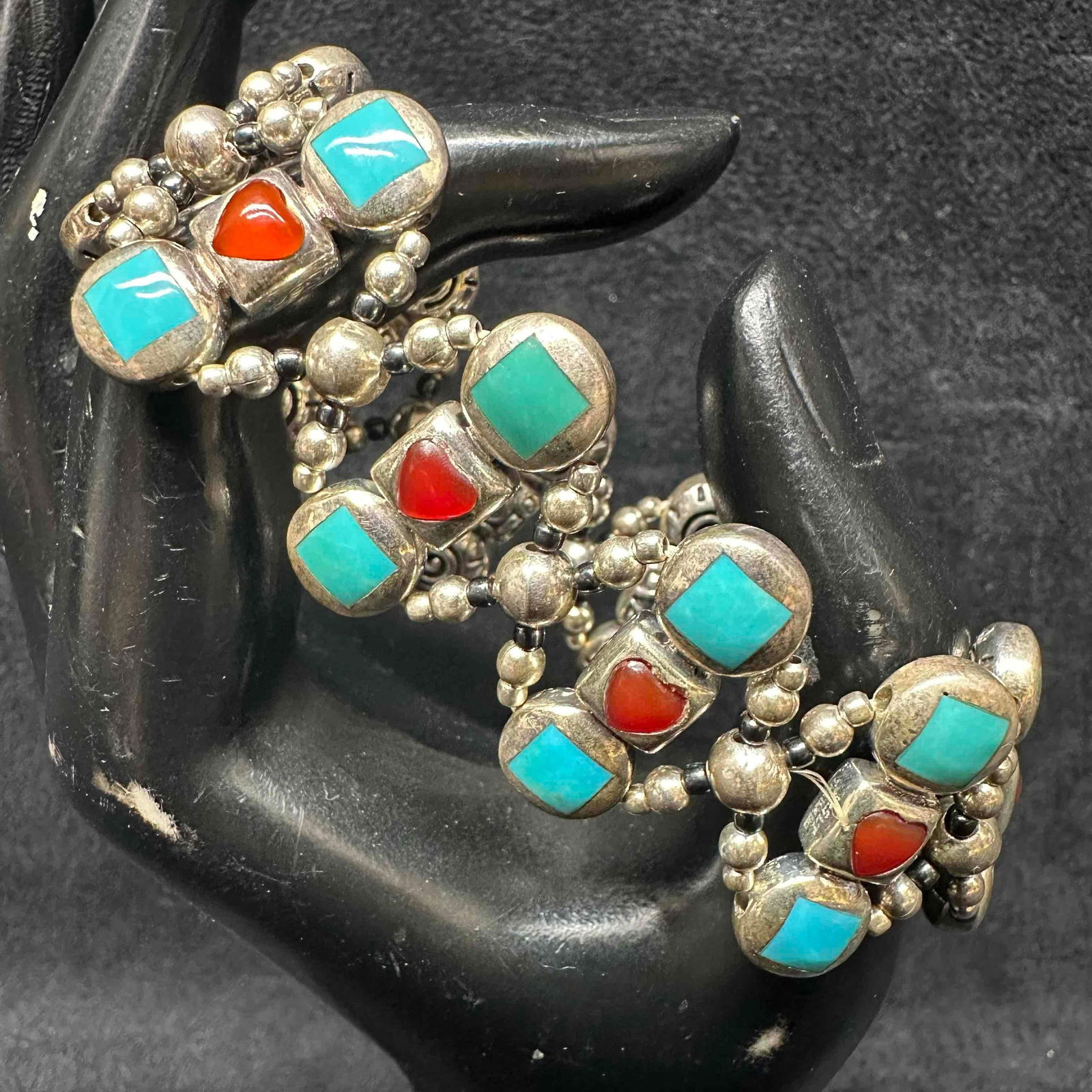 Red Agate and Turquoise Natural Stone Flexible Sterling Silver Stretch Bracelet: This item is in good pre-owned, previously used/displayed condition with noticeable light wear, and surface scratches. Please reference all photos for full details. This piece of jewelry has been test