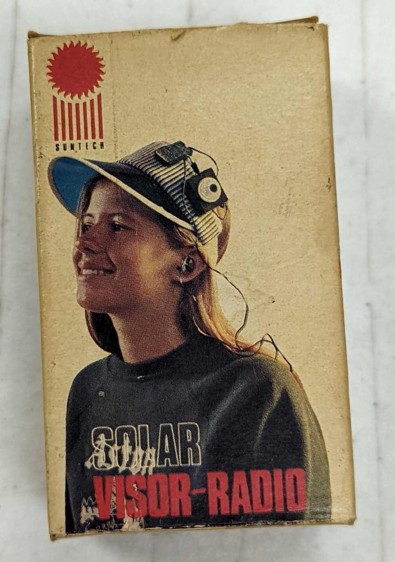 Vintage Solar Visor Radio By Solar General LTD: Vintage Solar Visor Radio By Solar General LTD. Both the solar panel and the radio are made to be strapped to a hat to power the radio, Comes in its original box which is approx 2" x 1 1/2" x 3 1/4"