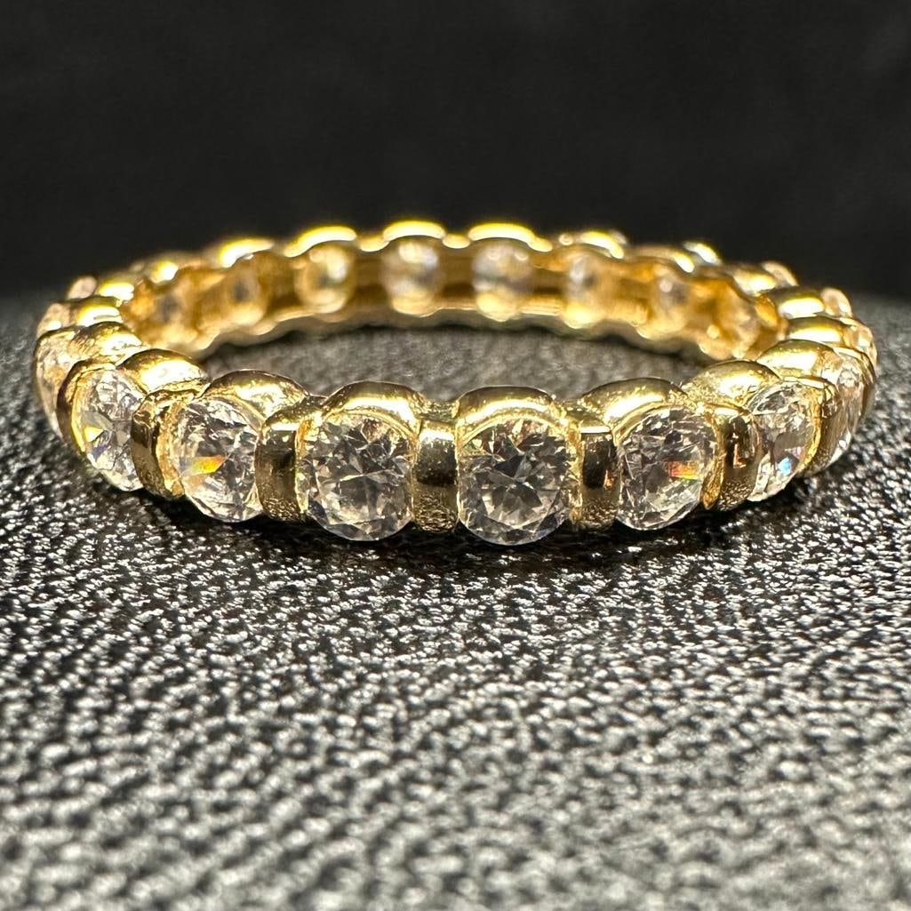 14k Gold CZ Bar-Set Band: This piece of jewelry has been tested and researched prior to listing. Please view all our pictures they are part of our description. DETAILS: Metal - 14k GoldColor - Yellow GoldStones - CZHallmarks