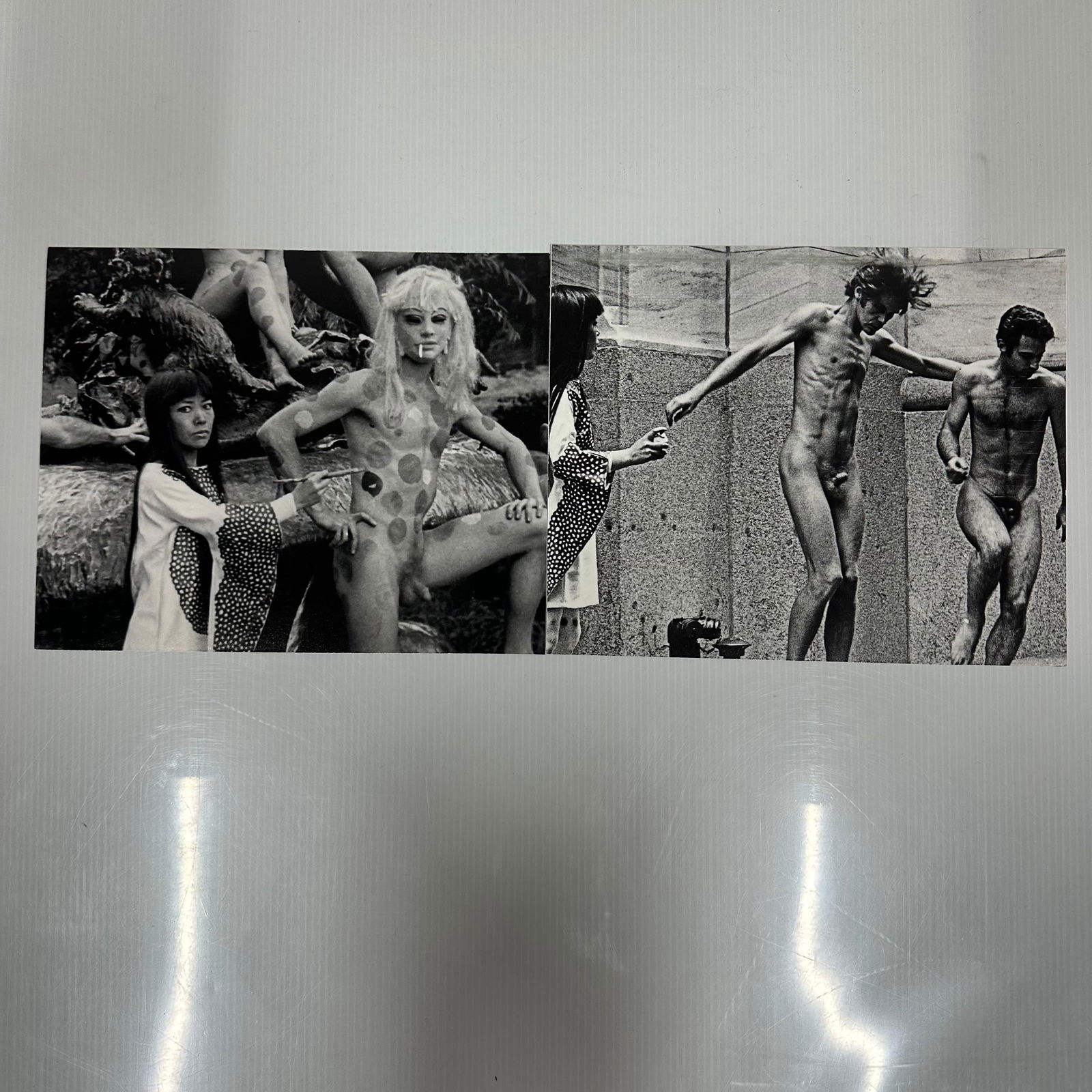 Yayoi Kusama Black and White Close Up Photo Print Set Body Festival Nude: Black and white close-up photographic prints depicting Yayoi Kusama posed with nude models in an outdoor setting. High-quality ink-jet prints. Unframed. No visible signature or edition number observe
