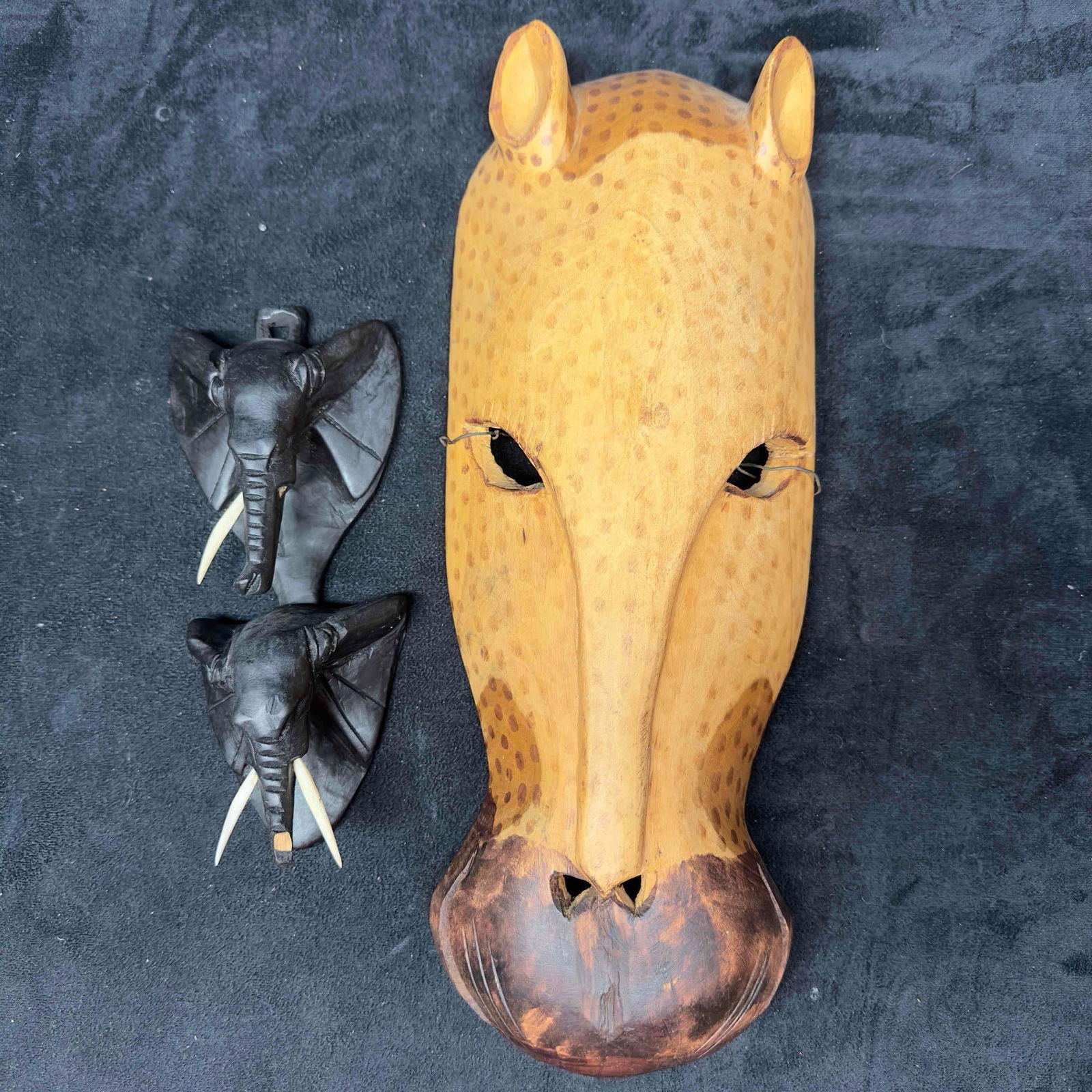 African Mask Kenya Hand Carved Wood Cheetah Cat Wall Art and Elephant Decor: African Mask Hand Carved Wood Cheetah Cat Wall Art and Elephant Decor. Each piece is hand carved and painted. Both pieces feature great detail. The elephant wall art has a chip on the wood and