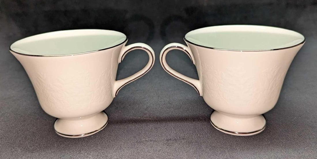 2 Wedgwood China Silver Ermine Contour Footed Cups A: 2 Wedgwood China Silver Ermine Contour Footed Cup A. This series was released from 1971 - 1993. Each cup is approx 4 1/2" x 3 1/2" x 3" and the total weight is 0.60lbs. The footed cups are