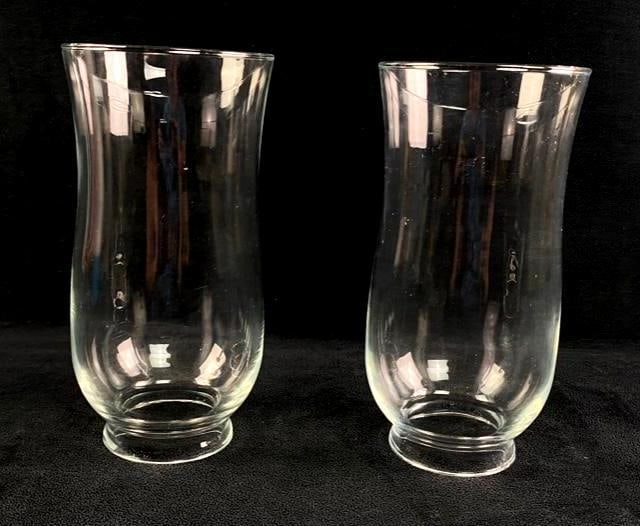 Pair of Hurricane Lamp Chimneys: Pair of Hurricane Lamp Chimneys Two hurricane lamp chimneys, can be used with an oil lamp element or with a candle for a classic decor element. Approximate size each: 4" diameter, 7.5"