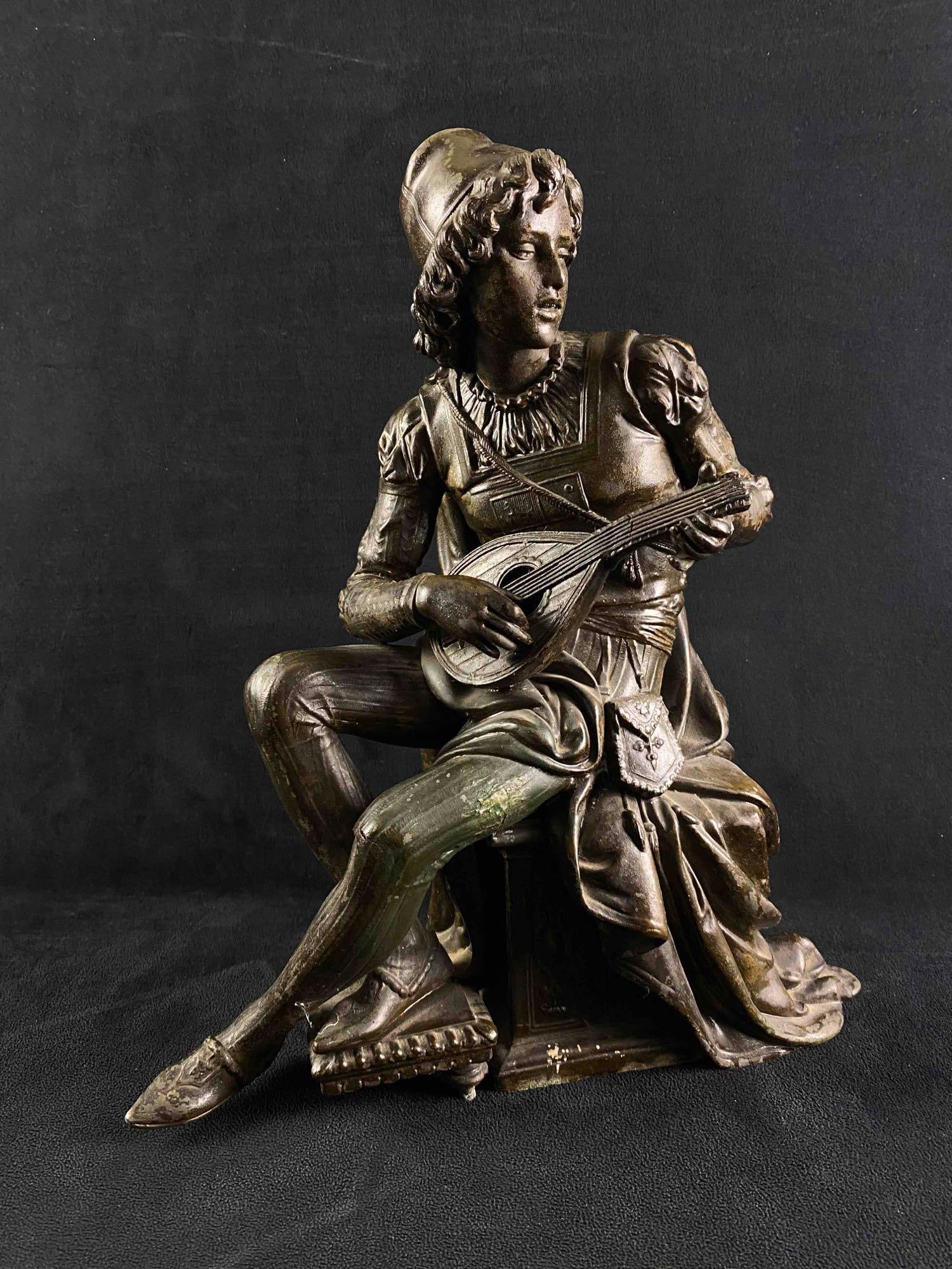 Antique Spelter Troubadour Lute Statue: Antique Spelter Troubadour Lute Statue Antique spelter statue of a troubadour playing a lute. The statue is in good condition, and appears to have had lacquer applied at some points to protect the