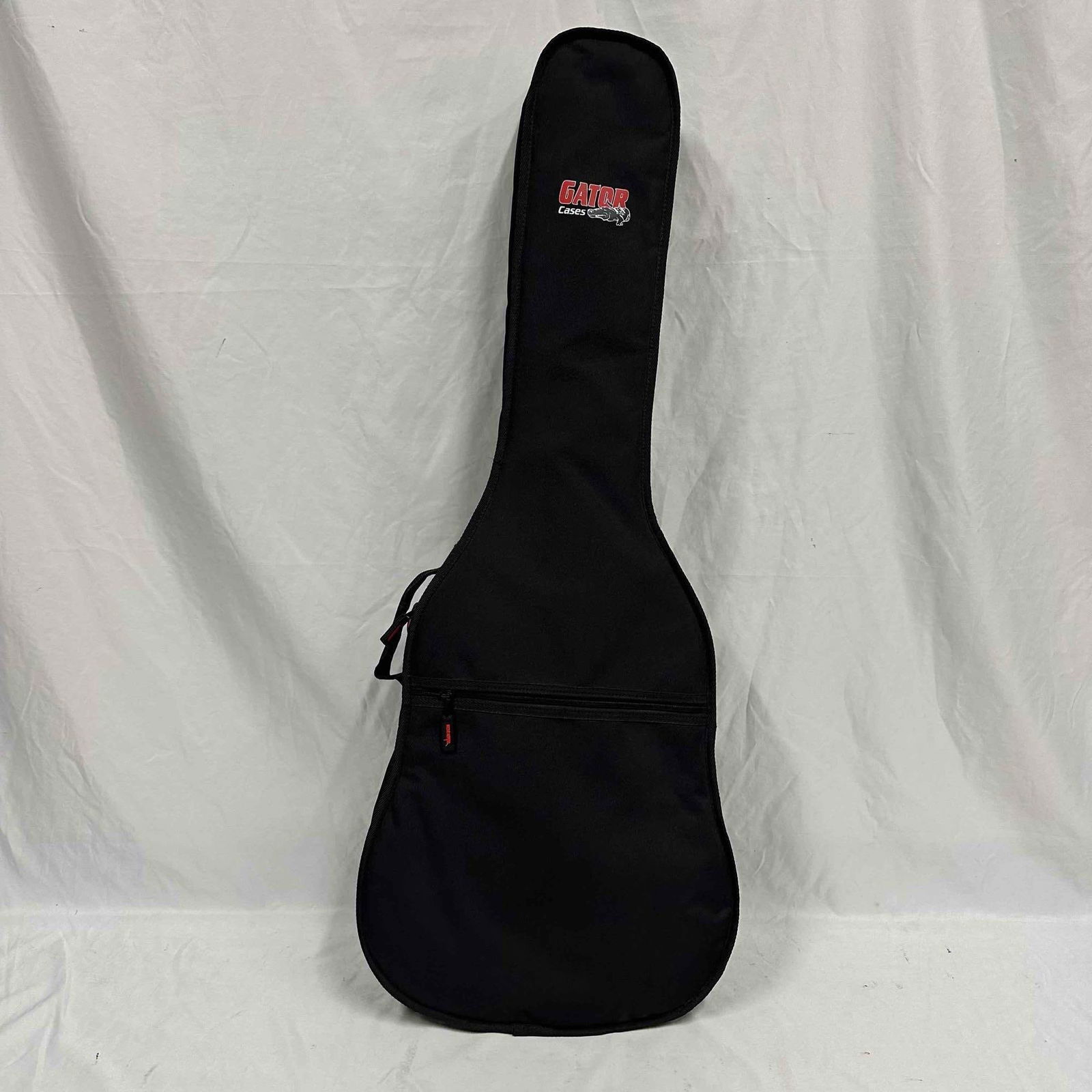 Vintage Yamaha FG-75 Acoustic Guitar with Strap and Gator Soft Case: Vintage Yamaha FG-75 acoustic guitar, made in Taiwan, Republic of China. This classic folk-style guitar features a natural spruce top with dark back and sides, accented by a tortoiseshell-style pick g