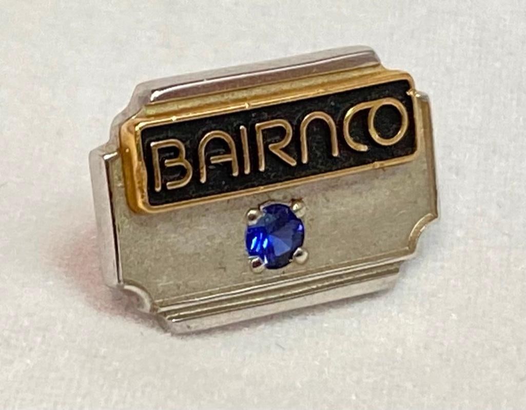 14k White Gold Pin with Sapphire Bairnco: This piece of jewelry has been tested and researched prior to testing . Please view all our pictures they are part of our description. DETAILS: Metal - 14k GoldColor - Silver/WhiteStones - Sapphire