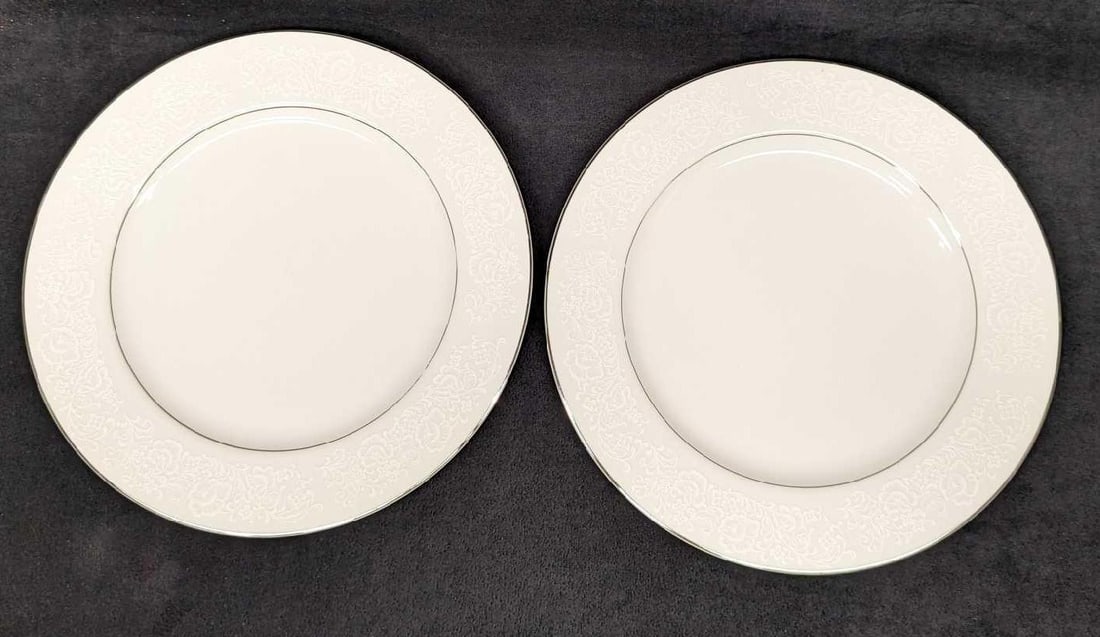 2 Retired International Fine China Juliet Dinner Plates B: 2 Retired International Fine China Juliet Dinner Plates B. Each plate is approx 7 5/8" x 7 5/8" x 3/4" and the total weight is 2.48 lbs. The plates do not have any chips or cracks. There is some wear