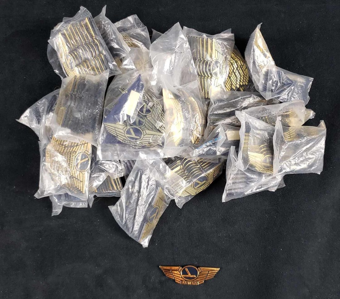 Lot of 280 Eastern Airlines Kids Badges: Lot of 280 Eastern Airlines Kids Badges. This lot of badges is in excellent used condition. The badges are in the original packaging in groupings of 10. The badges measure 2.5" L. Colors are gold and