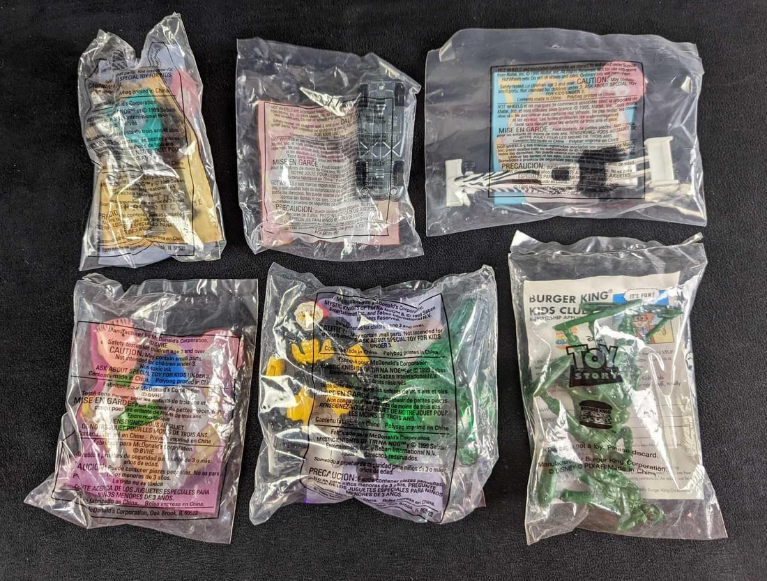 6 Happy Meal & Burger Kings Kids Meal Toys: This lot includes: (1) Happy Meal Mystic Knights -Angus Action Figure- #3. This is from 1999. Is approx 3 1/2" x 1 1/2" x 5 1/2" and it weighs 0.06lb.(1) Happy Meal Mystic Knights -Lugad