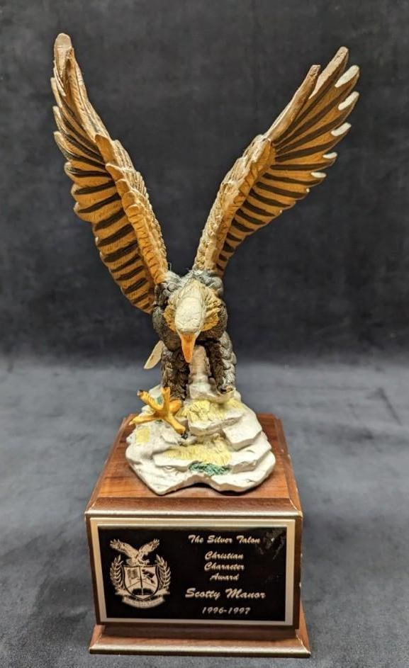 Large Eagle On Wood Base Award Mantlepiece: This was a Silver Talon Christian Character Award. Removable plaque is attached to a wooden base with a resin eagle with his wings spread. Award is approx 5 1/2" x 5 1/2" x 14 1/2" and it