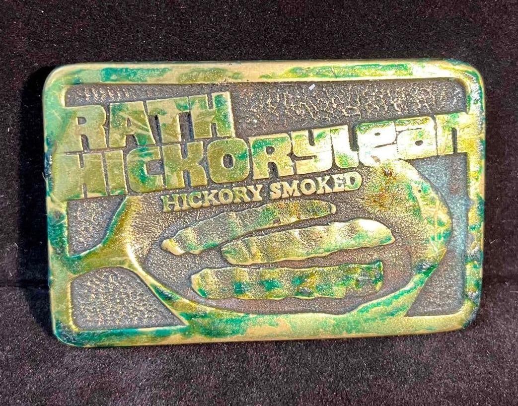 Rath Hickorylean Hickory Smoked Belt Buckle (F18): This lot contains a Rath Hickorylean Hickory Smoked Belt Buckle (F18). It is approx 3 1/2" x 2 1/4" x 3/4" and it weighs about 0.3lbs. Overall the Belt Buckle is in good used condition with some light