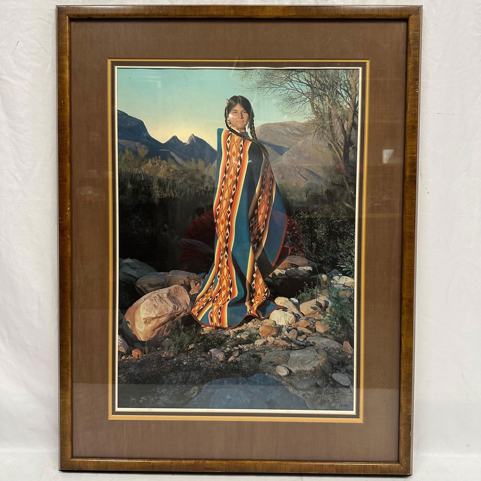 Donald V. Crowley Limited Edition Lithograph Desert Sunset Signed and Numbered Framed: Limited edition lithograph titled Desert Sunset by artist Donald V. Crowley, American, 1926-2022. Beautifully rendered Southwestern portrait depicting a Native woman in a patterned blanket against a