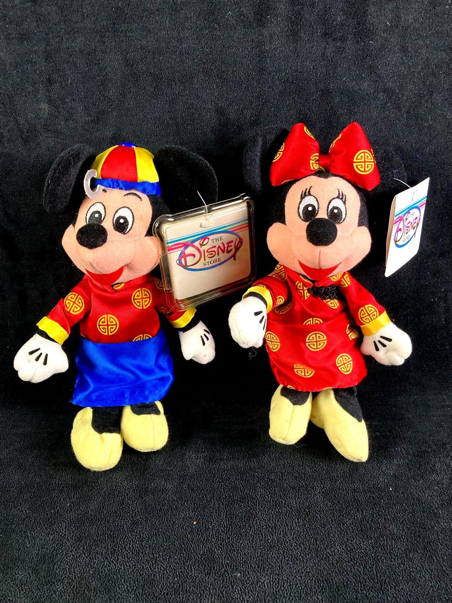Set of (2) Disney Bean Bag Doll Chinese New Year: This auction includes: (1) Disney Bean Bag Doll Chinese New Year Mickey (1) Disney Bean Bag Doll Chinese New Year Minnie Condition is used and refer to photographs for additional details. The